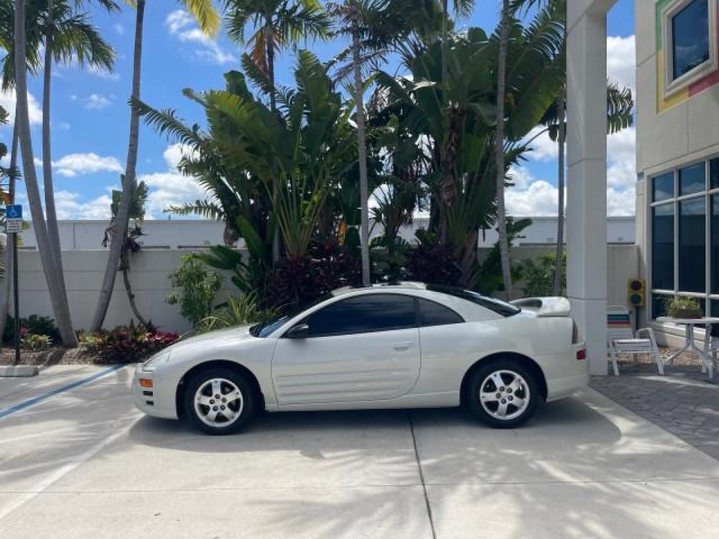 2004 Dover White Pearl /Midnight Mitsubishi Eclipse AUTO GS LOW MILES 57,084 (4A3AC44G24E) with an 2.4L SOHC MPFI 16-Valve I4 Engine engine, Automatic transmission, located at 4701 North Dixie Hwy, Pompano Beach, FL, 33064, (954) 422-2889, 26.240938, -80.123474 - OUR WEBPAGE FLORIDACARS1.COM HAS OVER 100 PHOTOS AND FREE CARFAX LINK 2004 MITSUBISHI ECLIPSE GS VIN: 4A3AC44G24E061723 4 A 3 A C 4 4 G 2 4 E 0 6 1 7 2 3 HATCHBACK 2 DR 2.4L I4 F GASOLINE FRONT WHEEL DRIVE Features Air Conditioning Alloy Wheels AM/FM Stereo Automatic Transmission CD Audio Cloth Seat - Photo#29