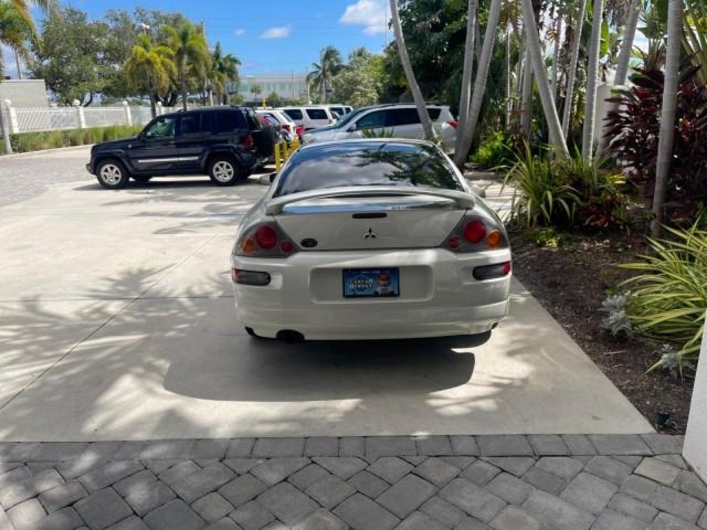 2004 Dover White Pearl /Midnight Mitsubishi Eclipse AUTO GS LOW MILES 57,084 (4A3AC44G24E) with an 2.4L SOHC MPFI 16-Valve I4 Engine engine, Automatic transmission, located at 4701 North Dixie Hwy, Pompano Beach, FL, 33064, (954) 422-2889, 26.240938, -80.123474 - OUR WEBPAGE FLORIDACARS1.COM HAS OVER 100 PHOTOS AND FREE CARFAX LINK 2004 MITSUBISHI ECLIPSE GS VIN: 4A3AC44G24E061723 4 A 3 A C 4 4 G 2 4 E 0 6 1 7 2 3 HATCHBACK 2 DR 2.4L I4 F GASOLINE FRONT WHEEL DRIVE Features Air Conditioning Alloy Wheels AM/FM Stereo Automatic Transmission CD Audio Cloth Seat - Photo#33