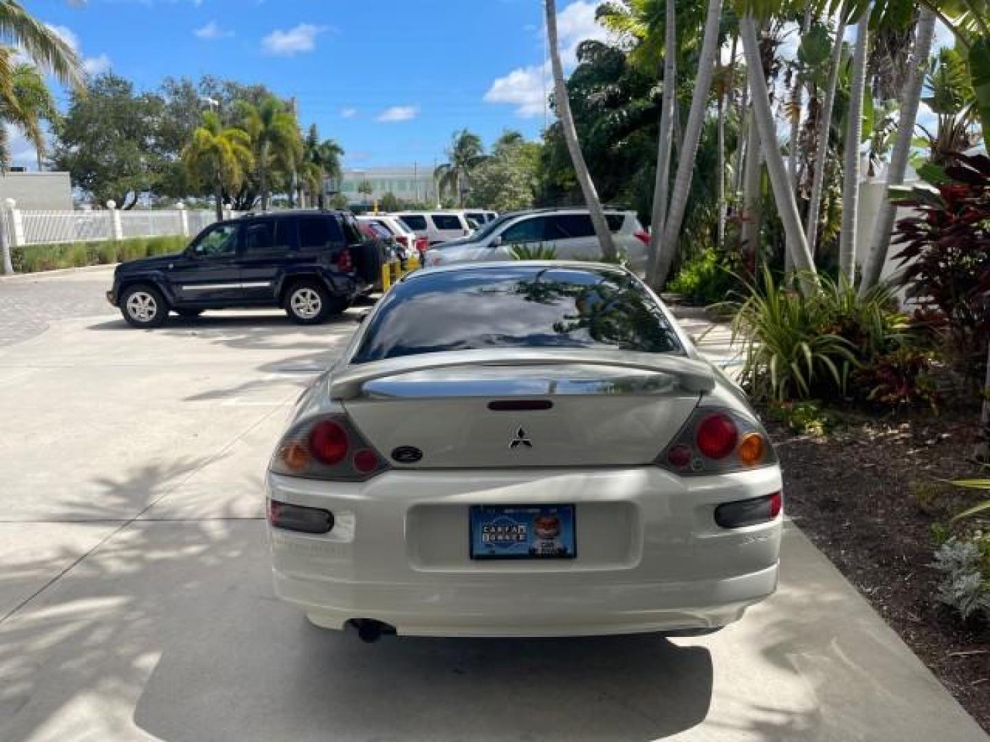 2004 Dover White Pearl /Midnight Mitsubishi Eclipse AUTO GS LOW MILES 57,084 (4A3AC44G24E) with an 2.4L SOHC MPFI 16-Valve I4 Engine engine, Automatic transmission, located at 4701 North Dixie Hwy, Pompano Beach, FL, 33064, (954) 422-2889, 26.240938, -80.123474 - OUR WEBPAGE FLORIDACARS1.COM HAS OVER 100 PHOTOS AND FREE CARFAX LINK 2004 MITSUBISHI ECLIPSE GS VIN: 4A3AC44G24E061723 4 A 3 A C 4 4 G 2 4 E 0 6 1 7 2 3 HATCHBACK 2 DR 2.4L I4 F GASOLINE FRONT WHEEL DRIVE Features Air Conditioning Alloy Wheels AM/FM Stereo Automatic Transmission CD Audio Cloth Seat - Photo#34