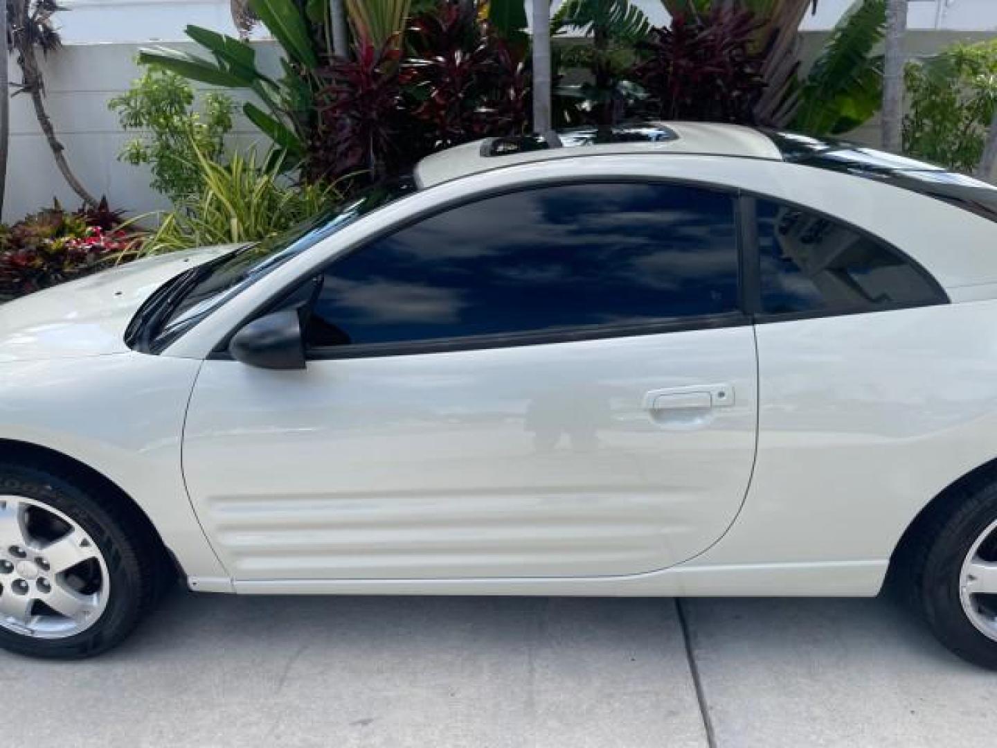 2004 Dover White Pearl /Midnight Mitsubishi Eclipse AUTO GS LOW MILES 57,084 (4A3AC44G24E) with an 2.4L SOHC MPFI 16-Valve I4 Engine engine, Automatic transmission, located at 4701 North Dixie Hwy, Pompano Beach, FL, 33064, (954) 422-2889, 26.240938, -80.123474 - OUR WEBPAGE FLORIDACARS1.COM HAS OVER 100 PHOTOS AND FREE CARFAX LINK 2004 MITSUBISHI ECLIPSE GS VIN: 4A3AC44G24E061723 4 A 3 A C 4 4 G 2 4 E 0 6 1 7 2 3 HATCHBACK 2 DR 2.4L I4 F GASOLINE FRONT WHEEL DRIVE Features Air Conditioning Alloy Wheels AM/FM Stereo Automatic Transmission CD Audio Cloth Seat - Photo#35
