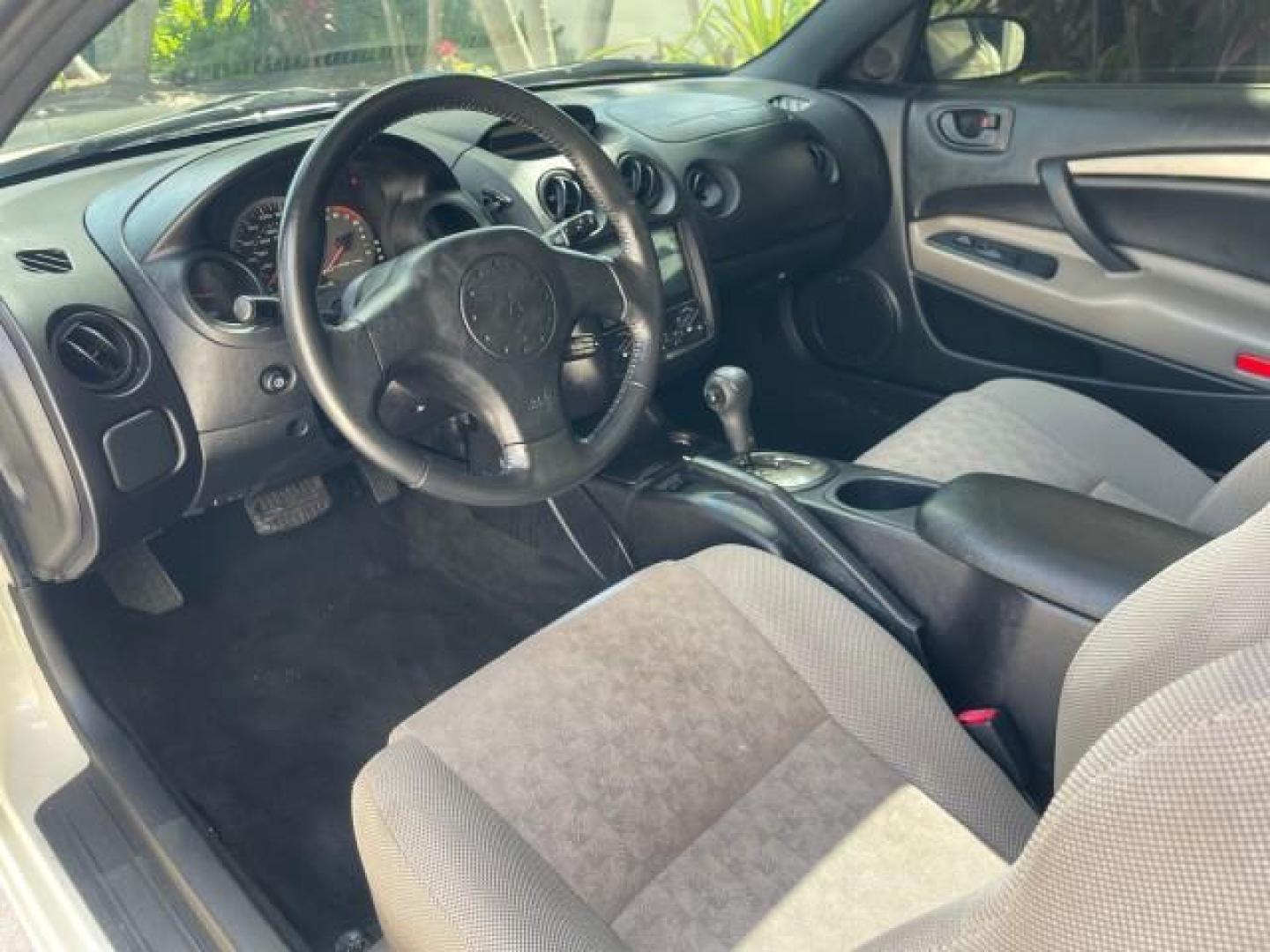 2004 Dover White Pearl /Midnight Mitsubishi Eclipse AUTO GS LOW MILES 57,084 (4A3AC44G24E) with an 2.4L SOHC MPFI 16-Valve I4 Engine engine, Automatic transmission, located at 4701 North Dixie Hwy, Pompano Beach, FL, 33064, (954) 422-2889, 26.240938, -80.123474 - OUR WEBPAGE FLORIDACARS1.COM HAS OVER 100 PHOTOS AND FREE CARFAX LINK 2004 MITSUBISHI ECLIPSE GS VIN: 4A3AC44G24E061723 4 A 3 A C 4 4 G 2 4 E 0 6 1 7 2 3 HATCHBACK 2 DR 2.4L I4 F GASOLINE FRONT WHEEL DRIVE Features Air Conditioning Alloy Wheels AM/FM Stereo Automatic Transmission CD Audio Cloth Seat - Photo#44