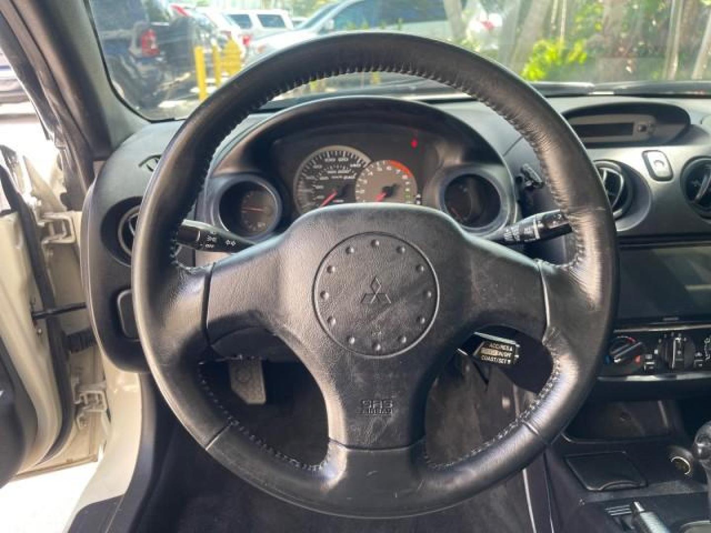 2004 Dover White Pearl /Midnight Mitsubishi Eclipse AUTO GS LOW MILES 57,084 (4A3AC44G24E) with an 2.4L SOHC MPFI 16-Valve I4 Engine engine, Automatic transmission, located at 4701 North Dixie Hwy, Pompano Beach, FL, 33064, (954) 422-2889, 26.240938, -80.123474 - OUR WEBPAGE FLORIDACARS1.COM HAS OVER 100 PHOTOS AND FREE CARFAX LINK 2004 MITSUBISHI ECLIPSE GS VIN: 4A3AC44G24E061723 4 A 3 A C 4 4 G 2 4 E 0 6 1 7 2 3 HATCHBACK 2 DR 2.4L I4 F GASOLINE FRONT WHEEL DRIVE Features Air Conditioning Alloy Wheels AM/FM Stereo Automatic Transmission CD Audio Cloth Seat - Photo#45