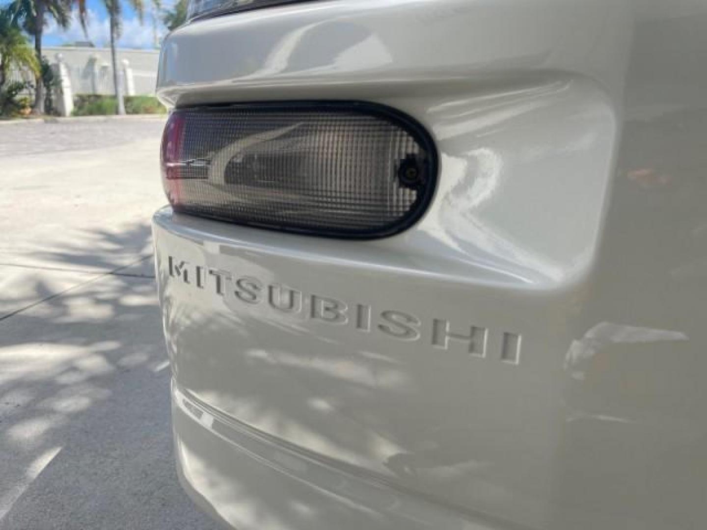 2004 Dover White Pearl /Midnight Mitsubishi Eclipse AUTO GS LOW MILES 57,084 (4A3AC44G24E) with an 2.4L SOHC MPFI 16-Valve I4 Engine engine, Automatic transmission, located at 4701 North Dixie Hwy, Pompano Beach, FL, 33064, (954) 422-2889, 26.240938, -80.123474 - OUR WEBPAGE FLORIDACARS1.COM HAS OVER 100 PHOTOS AND FREE CARFAX LINK 2004 MITSUBISHI ECLIPSE GS VIN: 4A3AC44G24E061723 4 A 3 A C 4 4 G 2 4 E 0 6 1 7 2 3 HATCHBACK 2 DR 2.4L I4 F GASOLINE FRONT WHEEL DRIVE Features Air Conditioning Alloy Wheels AM/FM Stereo Automatic Transmission CD Audio Cloth Seat - Photo#75