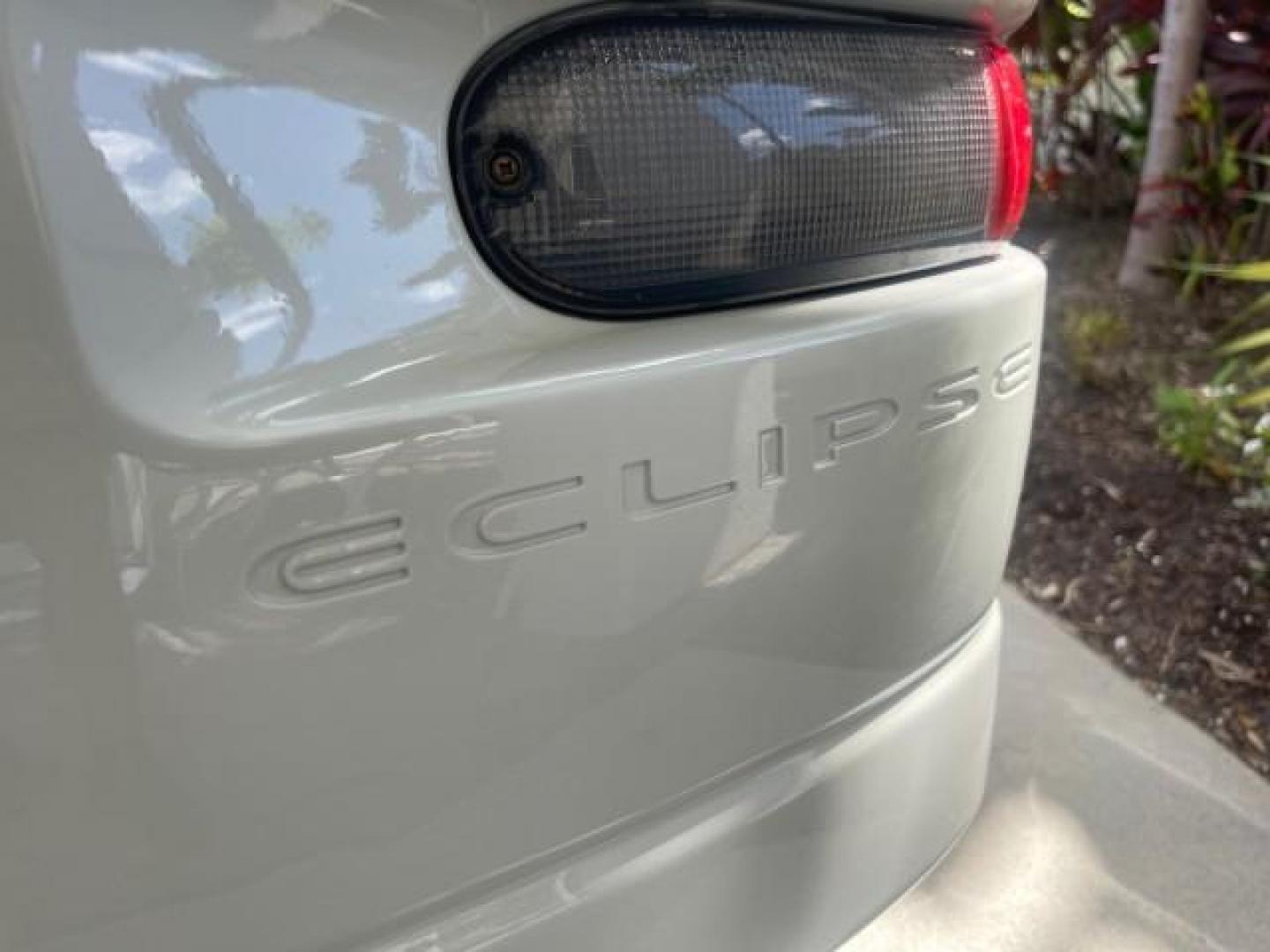 2004 Dover White Pearl /Midnight Mitsubishi Eclipse AUTO GS LOW MILES 57,084 (4A3AC44G24E) with an 2.4L SOHC MPFI 16-Valve I4 Engine engine, Automatic transmission, located at 4701 North Dixie Hwy, Pompano Beach, FL, 33064, (954) 422-2889, 26.240938, -80.123474 - OUR WEBPAGE FLORIDACARS1.COM HAS OVER 100 PHOTOS AND FREE CARFAX LINK 2004 MITSUBISHI ECLIPSE GS VIN: 4A3AC44G24E061723 4 A 3 A C 4 4 G 2 4 E 0 6 1 7 2 3 HATCHBACK 2 DR 2.4L I4 F GASOLINE FRONT WHEEL DRIVE Features Air Conditioning Alloy Wheels AM/FM Stereo Automatic Transmission CD Audio Cloth Seat - Photo#77