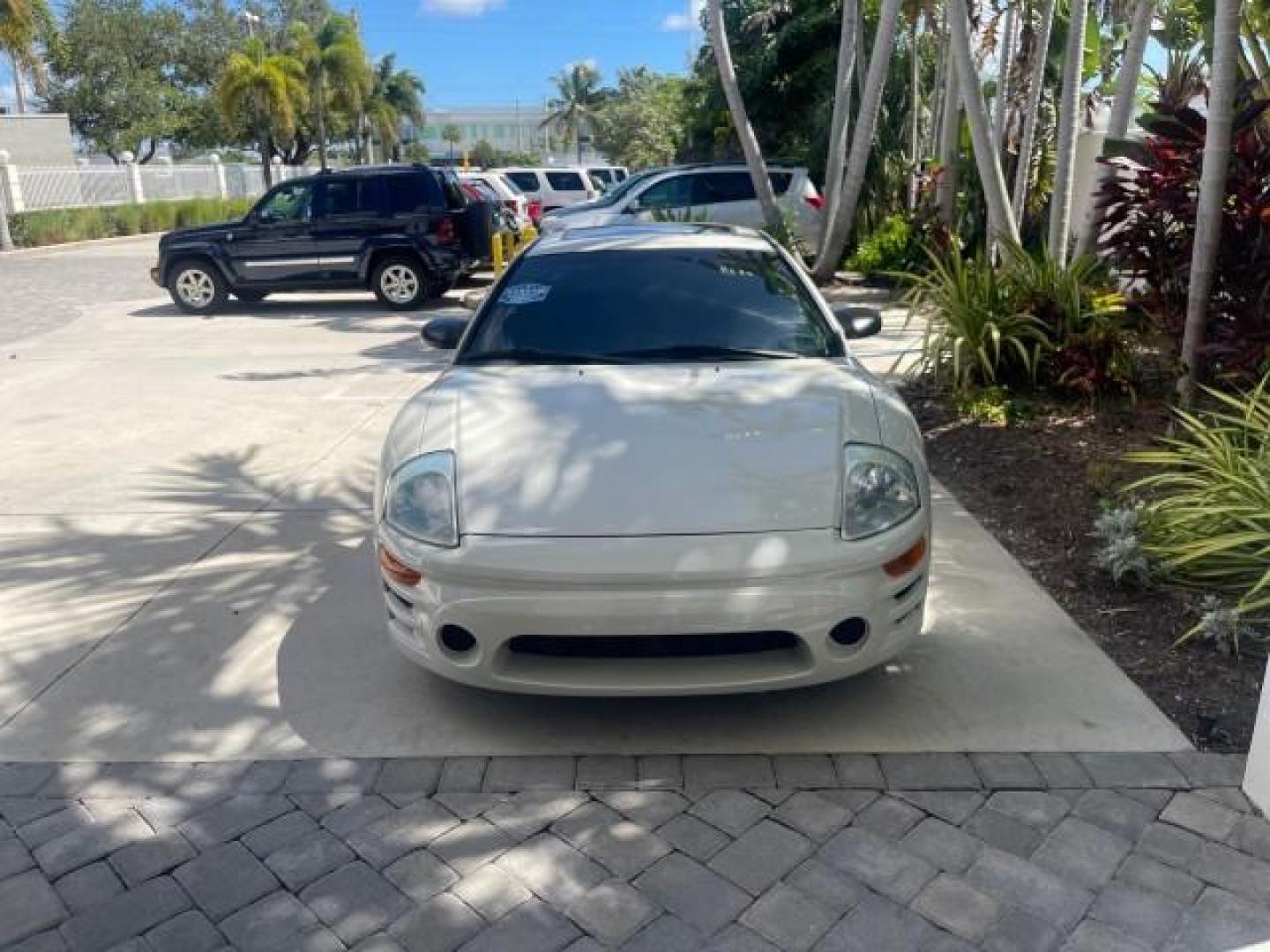 2004 Dover White Pearl /Midnight Mitsubishi Eclipse AUTO GS LOW MILES 57,084 (4A3AC44G24E) with an 2.4L SOHC MPFI 16-Valve I4 Engine engine, Automatic transmission, located at 4701 North Dixie Hwy, Pompano Beach, FL, 33064, (954) 422-2889, 26.240938, -80.123474 - OUR WEBPAGE FLORIDACARS1.COM HAS OVER 100 PHOTOS AND FREE CARFAX LINK 2004 MITSUBISHI ECLIPSE GS VIN: 4A3AC44G24E061723 4 A 3 A C 4 4 G 2 4 E 0 6 1 7 2 3 HATCHBACK 2 DR 2.4L I4 F GASOLINE FRONT WHEEL DRIVE Features Air Conditioning Alloy Wheels AM/FM Stereo Automatic Transmission CD Audio Cloth Seat - Photo#90