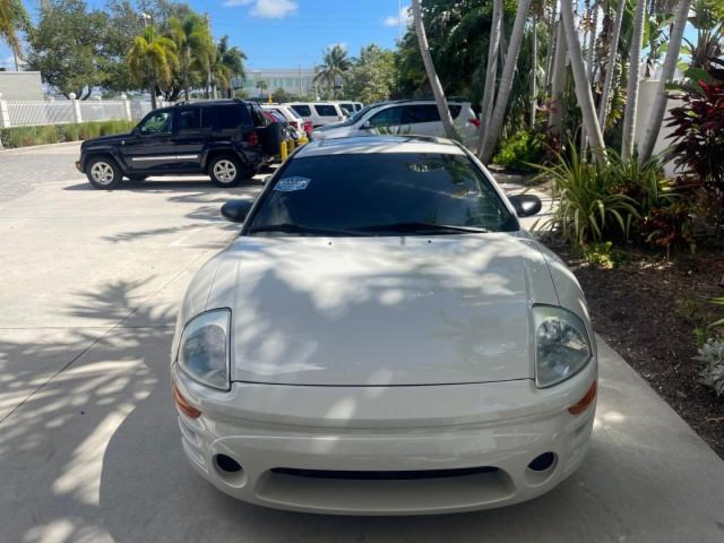 2004 Dover White Pearl /Midnight Mitsubishi Eclipse AUTO GS LOW MILES 57,084 (4A3AC44G24E) with an 2.4L SOHC MPFI 16-Valve I4 Engine engine, Automatic transmission, located at 4701 North Dixie Hwy, Pompano Beach, FL, 33064, (954) 422-2889, 26.240938, -80.123474 - OUR WEBPAGE FLORIDACARS1.COM HAS OVER 100 PHOTOS AND FREE CARFAX LINK 2004 MITSUBISHI ECLIPSE GS VIN: 4A3AC44G24E061723 4 A 3 A C 4 4 G 2 4 E 0 6 1 7 2 3 HATCHBACK 2 DR 2.4L I4 F GASOLINE FRONT WHEEL DRIVE Features Air Conditioning Alloy Wheels AM/FM Stereo Automatic Transmission CD Audio Cloth Seat - Photo#91