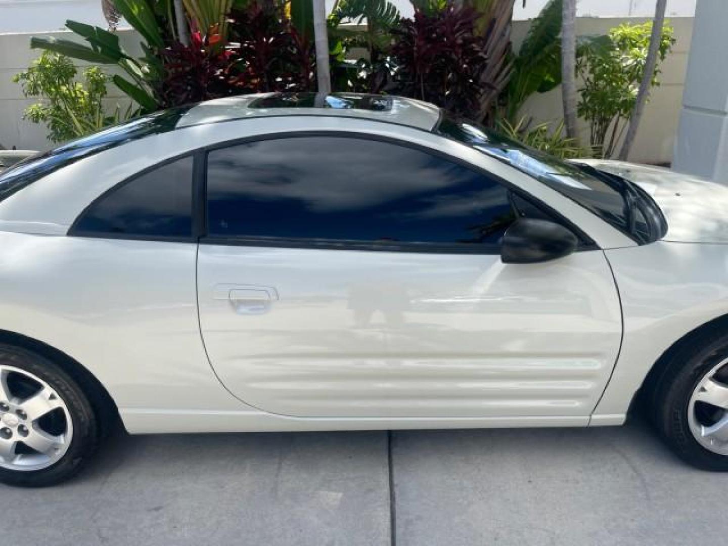 2004 Dover White Pearl /Midnight Mitsubishi Eclipse AUTO GS LOW MILES 57,084 (4A3AC44G24E) with an 2.4L SOHC MPFI 16-Valve I4 Engine engine, Automatic transmission, located at 4701 North Dixie Hwy, Pompano Beach, FL, 33064, (954) 422-2889, 26.240938, -80.123474 - OUR WEBPAGE FLORIDACARS1.COM HAS OVER 100 PHOTOS AND FREE CARFAX LINK 2004 MITSUBISHI ECLIPSE GS VIN: 4A3AC44G24E061723 4 A 3 A C 4 4 G 2 4 E 0 6 1 7 2 3 HATCHBACK 2 DR 2.4L I4 F GASOLINE FRONT WHEEL DRIVE Features Air Conditioning Alloy Wheels AM/FM Stereo Automatic Transmission CD Audio Cloth Seat - Photo#92