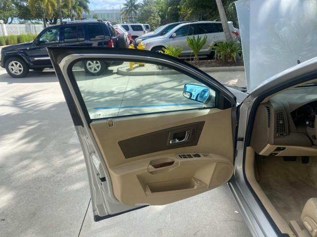 2006 Light Platinum /Cashmere Cadillac CTS LOW MILES 30,356 3.6 V6 VVT (1G6DP577160) with an 3.6L V6 VVT Engine engine, Automatic transmission, located at 4701 North Dixie Hwy, Pompano Beach, FL, 33064, (954) 422-2889, 26.240938, -80.123474 - OUR WEBPAGE FLORIDACARS1.COM HAS OVER 100 PHOTOS AND FREE CARFAX LINK 2006 CADILLAC CTS VIN: 1G6DP577160124562 1 G 6 D P 5 7 7 1 6 0 1 2 4 5 6 2 SEDAN 4 DR 3.6L V6 F GASOLINE REAR WHEEL DRIVE Features ABS Brakes Air Conditioning Alloy Wheels AM/FM Stereo Automatic Transmission CD Audio Cruise Contro - Photo#9