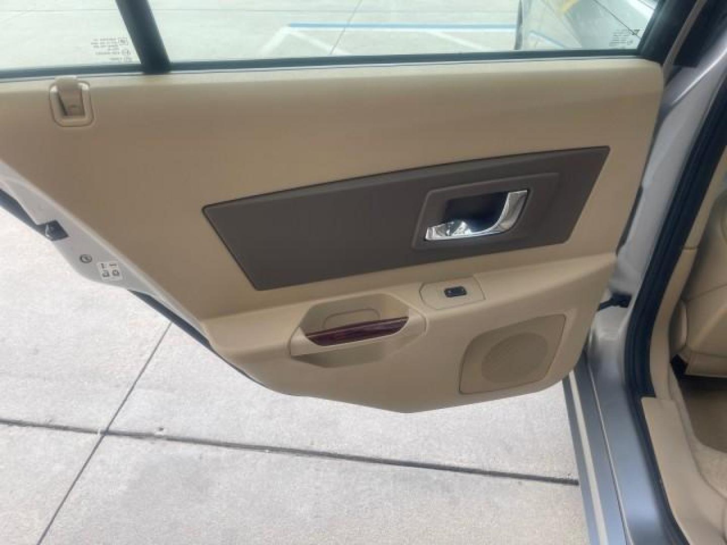 2006 Light Platinum /Cashmere Cadillac CTS LOW MILES 30,356 3.6 V6 VVT (1G6DP577160) with an 3.6L V6 VVT Engine engine, Automatic transmission, located at 4701 North Dixie Hwy, Pompano Beach, FL, 33064, (954) 422-2889, 26.240938, -80.123474 - OUR WEBPAGE FLORIDACARS1.COM HAS OVER 100 PHOTOS AND FREE CARFAX LINK 2006 CADILLAC CTS VIN: 1G6DP577160124562 1 G 6 D P 5 7 7 1 6 0 1 2 4 5 6 2 SEDAN 4 DR 3.6L V6 F GASOLINE REAR WHEEL DRIVE Features ABS Brakes Air Conditioning Alloy Wheels AM/FM Stereo Automatic Transmission CD Audio Cruise Contro - Photo#71