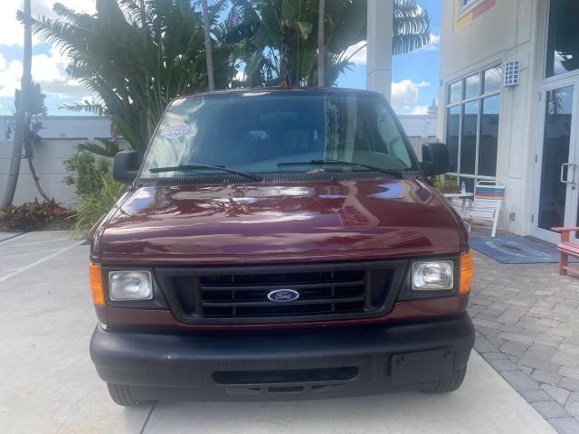 2006 Dark Toreador Red Metallic /Medium Flint Ford Econoline Wagon XLT 8 PASS LOW MILES 56328 (1FMRE11W06D) with an 4.6L EFI V8 Engine engine, Automatic transmission, located at 4701 North Dixie Hwy, Pompano Beach, FL, 33064, (954) 422-2889, 26.240938, -80.123474 - OUR WEBPAGE FLORIDACARS1.COM HAS OVER 100 PHOTOS AND FREE CARFAX LINK 2006 FORD E-SERIES E-150 XLT VIN: 1FMRE11W06DA64988 1 F M R E 1 1 W 0 6 D A 6 4 9 8 8 VAN 4.6L V8 F GASOLINE REAR WHEEL DRIVE Features ABS Brakes Air Conditioning AM/FM Stereo Automatic Transmission CD Audio Cruise Control Power L - Photo#2