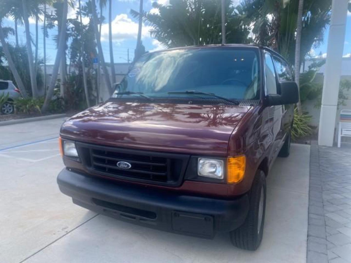 2006 Dark Toreador Red Metallic /Medium Flint Ford Econoline Wagon XLT 8 PASS LOW MILES 56290 (1FMRE11W06D) with an 4.6L EFI V8 Engine engine, Automatic transmission, located at 4701 North Dixie Hwy, Pompano Beach, FL, 33064, (954) 422-2889, 26.240938, -80.123474 - OUR WEBPAGE FLORIDACARS1.COM HAS OVER 100 PHOTOS AND FREE CARFAX LINK 2006 FORD E-SERIES E-150 XLT VIN: 1FMRE11W06DA64988 1 F M R E 1 1 W 0 6 D A 6 4 9 8 8 VAN 4.6L V8 F GASOLINE REAR WHEEL DRIVE Features ABS Brakes Air Conditioning AM/FM Stereo Automatic Transmission CD Audio Cruise Control Power L - Photo#3