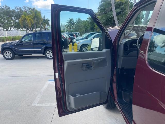 2006 Dark Toreador Red Metallic /Medium Flint Ford Econoline Wagon XLT 8 PASS LOW MILES 56328 (1FMRE11W06D) with an 4.6L EFI V8 Engine engine, Automatic transmission, located at 4701 North Dixie Hwy, Pompano Beach, FL, 33064, (954) 422-2889, 26.240938, -80.123474 - OUR WEBPAGE FLORIDACARS1.COM HAS OVER 100 PHOTOS AND FREE CARFAX LINK 2006 FORD E-SERIES E-150 XLT VIN: 1FMRE11W06DA64988 1 F M R E 1 1 W 0 6 D A 6 4 9 8 8 VAN 4.6L V8 F GASOLINE REAR WHEEL DRIVE Features ABS Brakes Air Conditioning AM/FM Stereo Automatic Transmission CD Audio Cruise Control Power L - Photo#9