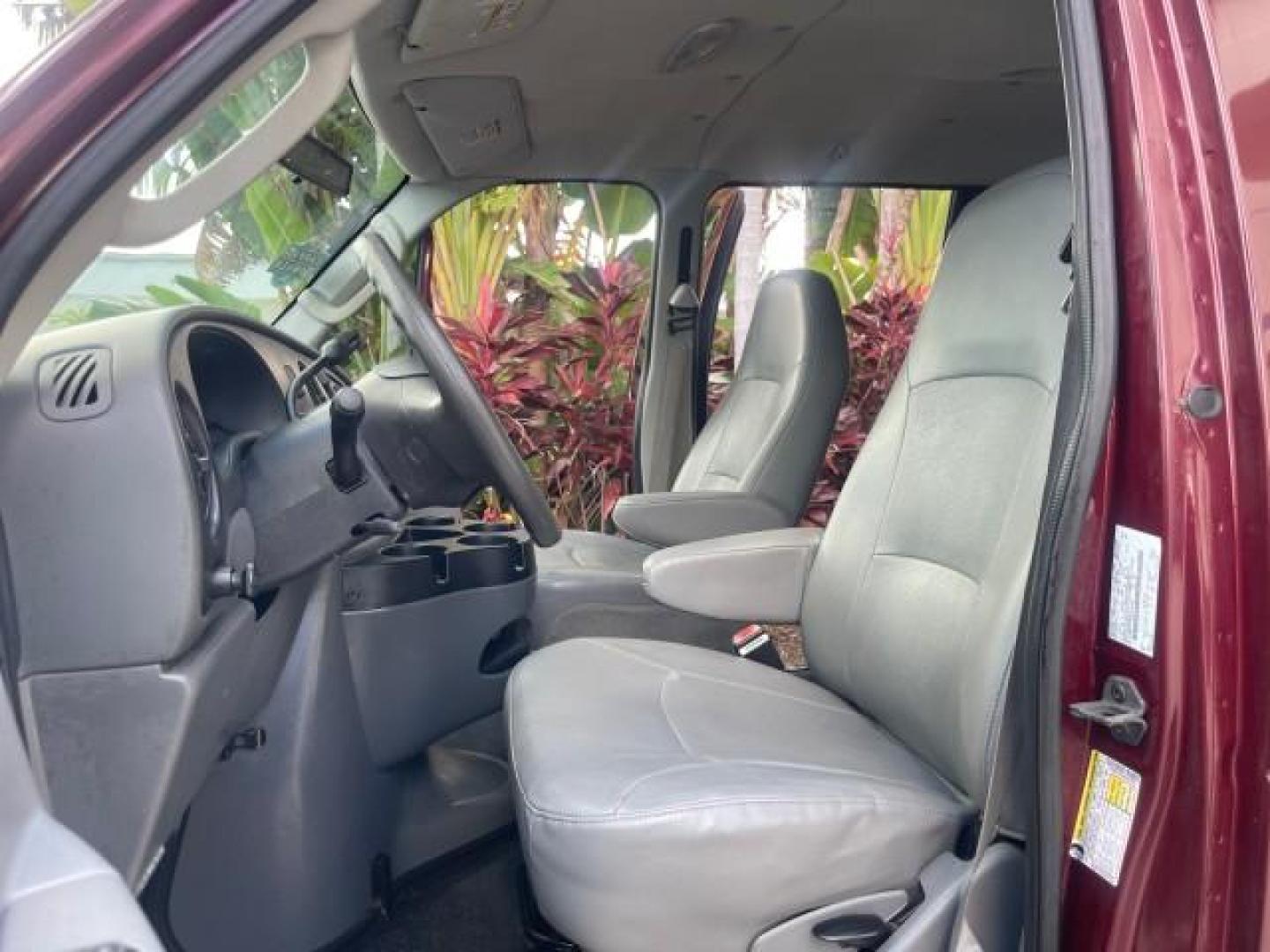 2006 Dark Toreador Red Metallic /Medium Flint Ford Econoline Wagon XLT 8 PASS LOW MILES 56290 (1FMRE11W06D) with an 4.6L EFI V8 Engine engine, Automatic transmission, located at 4701 North Dixie Hwy, Pompano Beach, FL, 33064, (954) 422-2889, 26.240938, -80.123474 - OUR WEBPAGE FLORIDACARS1.COM HAS OVER 100 PHOTOS AND FREE CARFAX LINK 2006 FORD E-SERIES E-150 XLT VIN: 1FMRE11W06DA64988 1 F M R E 1 1 W 0 6 D A 6 4 9 8 8 VAN 4.6L V8 F GASOLINE REAR WHEEL DRIVE Features ABS Brakes Air Conditioning AM/FM Stereo Automatic Transmission CD Audio Cruise Control Power L - Photo#10