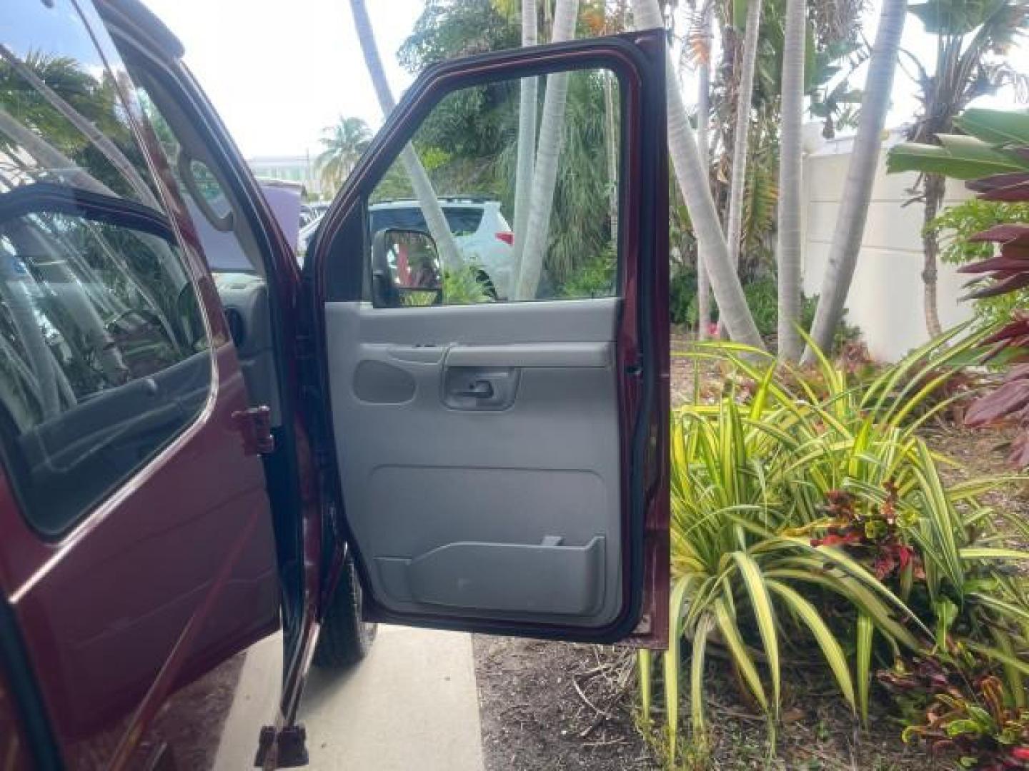 2006 Dark Toreador Red Metallic /Medium Flint Ford Econoline Wagon XLT 8 PASS LOW MILES 56290 (1FMRE11W06D) with an 4.6L EFI V8 Engine engine, Automatic transmission, located at 4701 North Dixie Hwy, Pompano Beach, FL, 33064, (954) 422-2889, 26.240938, -80.123474 - OUR WEBPAGE FLORIDACARS1.COM HAS OVER 100 PHOTOS AND FREE CARFAX LINK 2006 FORD E-SERIES E-150 XLT VIN: 1FMRE11W06DA64988 1 F M R E 1 1 W 0 6 D A 6 4 9 8 8 VAN 4.6L V8 F GASOLINE REAR WHEEL DRIVE Features ABS Brakes Air Conditioning AM/FM Stereo Automatic Transmission CD Audio Cruise Control Power L - Photo#11