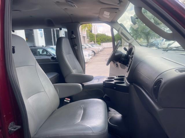 2006 Dark Toreador Red Metallic /Medium Flint Ford Econoline Wagon XLT 8 PASS LOW MILES 56328 (1FMRE11W06D) with an 4.6L EFI V8 Engine engine, Automatic transmission, located at 4701 North Dixie Hwy, Pompano Beach, FL, 33064, (954) 422-2889, 26.240938, -80.123474 - OUR WEBPAGE FLORIDACARS1.COM HAS OVER 100 PHOTOS AND FREE CARFAX LINK 2006 FORD E-SERIES E-150 XLT VIN: 1FMRE11W06DA64988 1 F M R E 1 1 W 0 6 D A 6 4 9 8 8 VAN 4.6L V8 F GASOLINE REAR WHEEL DRIVE Features ABS Brakes Air Conditioning AM/FM Stereo Automatic Transmission CD Audio Cruise Control Power L - Photo#12