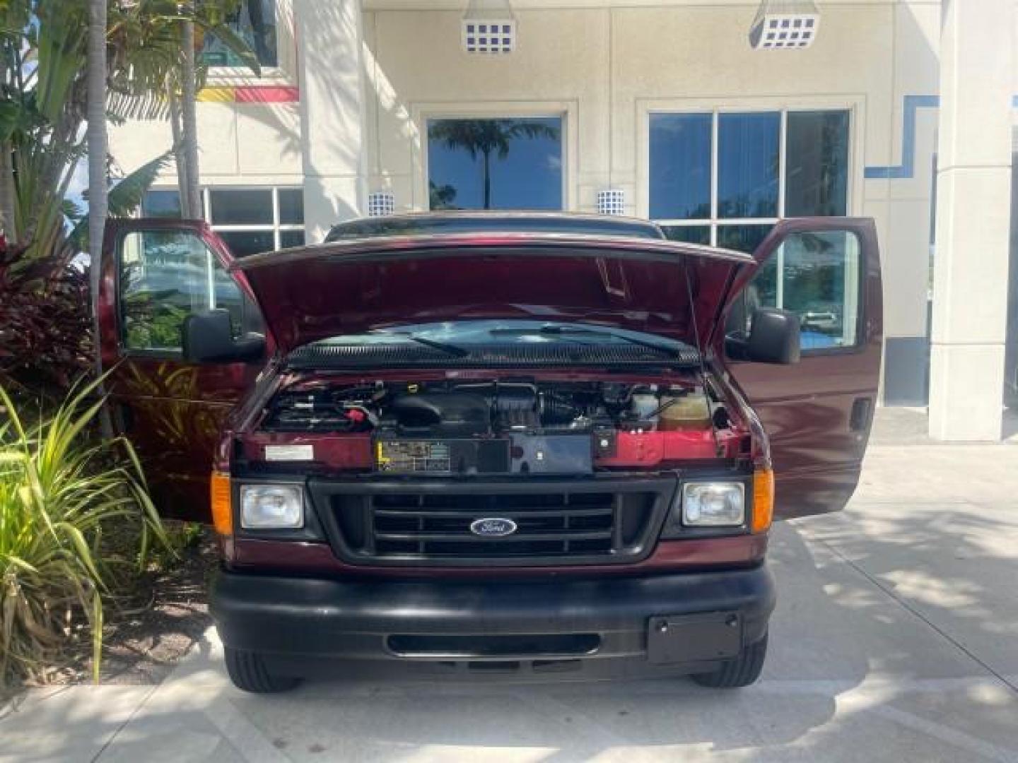 2006 Dark Toreador Red Metallic /Medium Flint Ford Econoline Wagon XLT 8 PASS LOW MILES 56290 (1FMRE11W06D) with an 4.6L EFI V8 Engine engine, Automatic transmission, located at 4701 North Dixie Hwy, Pompano Beach, FL, 33064, (954) 422-2889, 26.240938, -80.123474 - OUR WEBPAGE FLORIDACARS1.COM HAS OVER 100 PHOTOS AND FREE CARFAX LINK 2006 FORD E-SERIES E-150 XLT VIN: 1FMRE11W06DA64988 1 F M R E 1 1 W 0 6 D A 6 4 9 8 8 VAN 4.6L V8 F GASOLINE REAR WHEEL DRIVE Features ABS Brakes Air Conditioning AM/FM Stereo Automatic Transmission CD Audio Cruise Control Power L - Photo#17