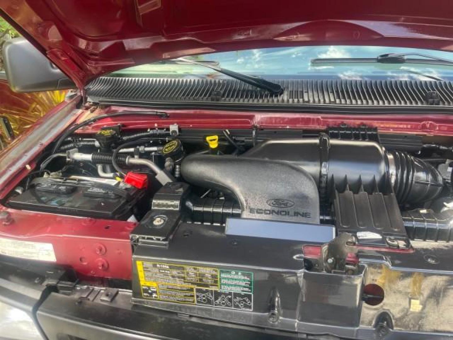 2006 Dark Toreador Red Metallic /Medium Flint Ford Econoline Wagon XLT 8 PASS LOW MILES 56290 (1FMRE11W06D) with an 4.6L EFI V8 Engine engine, Automatic transmission, located at 4701 North Dixie Hwy, Pompano Beach, FL, 33064, (954) 422-2889, 26.240938, -80.123474 - OUR WEBPAGE FLORIDACARS1.COM HAS OVER 100 PHOTOS AND FREE CARFAX LINK 2006 FORD E-SERIES E-150 XLT VIN: 1FMRE11W06DA64988 1 F M R E 1 1 W 0 6 D A 6 4 9 8 8 VAN 4.6L V8 F GASOLINE REAR WHEEL DRIVE Features ABS Brakes Air Conditioning AM/FM Stereo Automatic Transmission CD Audio Cruise Control Power L - Photo#25