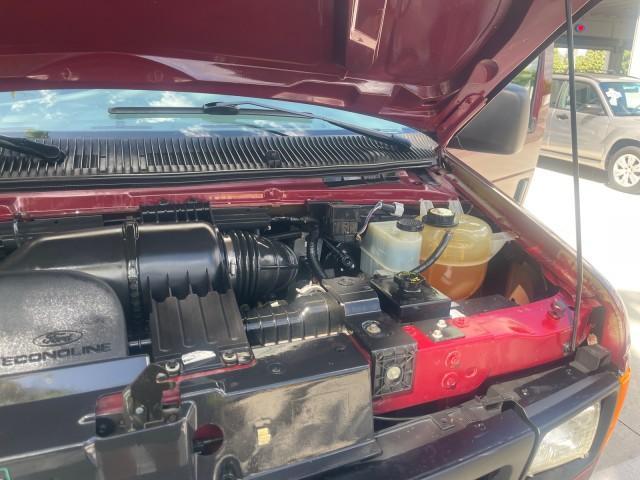 2006 Dark Toreador Red Metallic /Medium Flint Ford Econoline Wagon XLT 8 PASS LOW MILES 56328 (1FMRE11W06D) with an 4.6L EFI V8 Engine engine, Automatic transmission, located at 4701 North Dixie Hwy, Pompano Beach, FL, 33064, (954) 422-2889, 26.240938, -80.123474 - OUR WEBPAGE FLORIDACARS1.COM HAS OVER 100 PHOTOS AND FREE CARFAX LINK 2006 FORD E-SERIES E-150 XLT VIN: 1FMRE11W06DA64988 1 F M R E 1 1 W 0 6 D A 6 4 9 8 8 VAN 4.6L V8 F GASOLINE REAR WHEEL DRIVE Features ABS Brakes Air Conditioning AM/FM Stereo Automatic Transmission CD Audio Cruise Control Power L - Photo#26