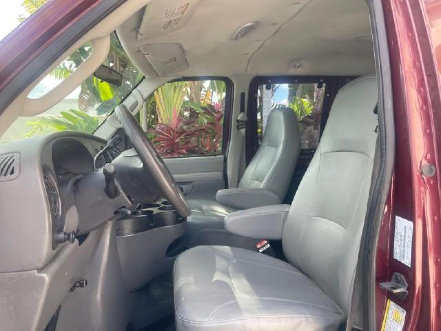 2006 Dark Toreador Red Metallic /Medium Flint Ford Econoline Wagon XLT 8 PASS LOW MILES 56290 (1FMRE11W06D) with an 4.6L EFI V8 Engine engine, Automatic transmission, located at 4701 North Dixie Hwy, Pompano Beach, FL, 33064, (954) 422-2889, 26.240938, -80.123474 - OUR WEBPAGE FLORIDACARS1.COM HAS OVER 100 PHOTOS AND FREE CARFAX LINK 2006 FORD E-SERIES E-150 XLT VIN: 1FMRE11W06DA64988 1 F M R E 1 1 W 0 6 D A 6 4 9 8 8 VAN 4.6L V8 F GASOLINE REAR WHEEL DRIVE Features ABS Brakes Air Conditioning AM/FM Stereo Automatic Transmission CD Audio Cruise Control Power L - Photo#41
