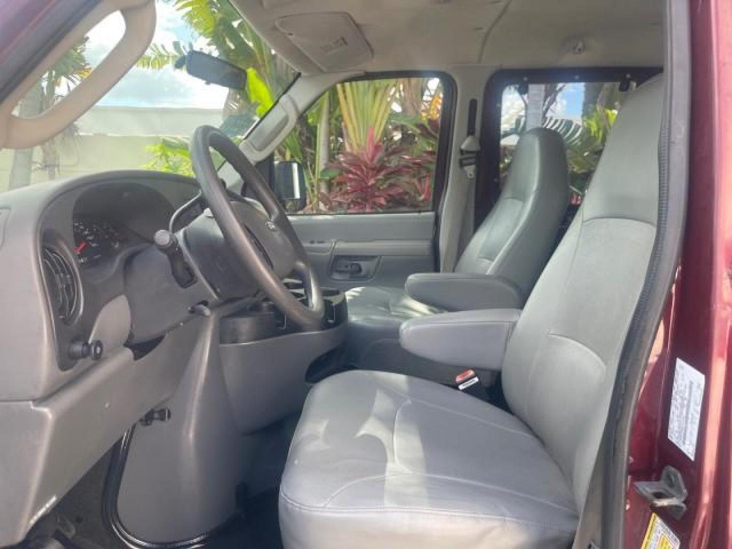 2006 Dark Toreador Red Metallic /Medium Flint Ford Econoline Wagon XLT 8 PASS LOW MILES 56290 (1FMRE11W06D) with an 4.6L EFI V8 Engine engine, Automatic transmission, located at 4701 North Dixie Hwy, Pompano Beach, FL, 33064, (954) 422-2889, 26.240938, -80.123474 - OUR WEBPAGE FLORIDACARS1.COM HAS OVER 100 PHOTOS AND FREE CARFAX LINK 2006 FORD E-SERIES E-150 XLT VIN: 1FMRE11W06DA64988 1 F M R E 1 1 W 0 6 D A 6 4 9 8 8 VAN 4.6L V8 F GASOLINE REAR WHEEL DRIVE Features ABS Brakes Air Conditioning AM/FM Stereo Automatic Transmission CD Audio Cruise Control Power L - Photo#43