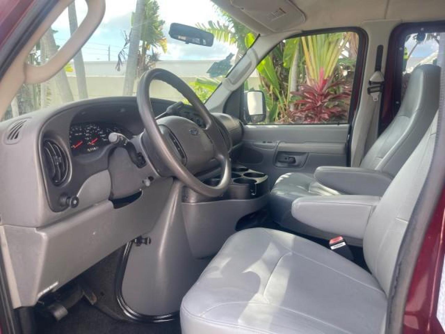 2006 Dark Toreador Red Metallic /Medium Flint Ford Econoline Wagon XLT 8 PASS LOW MILES 56290 (1FMRE11W06D) with an 4.6L EFI V8 Engine engine, Automatic transmission, located at 4701 North Dixie Hwy, Pompano Beach, FL, 33064, (954) 422-2889, 26.240938, -80.123474 - OUR WEBPAGE FLORIDACARS1.COM HAS OVER 100 PHOTOS AND FREE CARFAX LINK 2006 FORD E-SERIES E-150 XLT VIN: 1FMRE11W06DA64988 1 F M R E 1 1 W 0 6 D A 6 4 9 8 8 VAN 4.6L V8 F GASOLINE REAR WHEEL DRIVE Features ABS Brakes Air Conditioning AM/FM Stereo Automatic Transmission CD Audio Cruise Control Power L - Photo#44