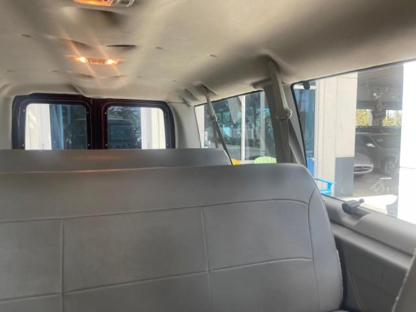 2006 Dark Toreador Red Metallic /Medium Flint Ford Econoline Wagon XLT 8 PASS LOW MILES 56290 (1FMRE11W06D) with an 4.6L EFI V8 Engine engine, Automatic transmission, located at 4701 North Dixie Hwy, Pompano Beach, FL, 33064, (954) 422-2889, 26.240938, -80.123474 - OUR WEBPAGE FLORIDACARS1.COM HAS OVER 100 PHOTOS AND FREE CARFAX LINK 2006 FORD E-SERIES E-150 XLT VIN: 1FMRE11W06DA64988 1 F M R E 1 1 W 0 6 D A 6 4 9 8 8 VAN 4.6L V8 F GASOLINE REAR WHEEL DRIVE Features ABS Brakes Air Conditioning AM/FM Stereo Automatic Transmission CD Audio Cruise Control Power L - Photo#66