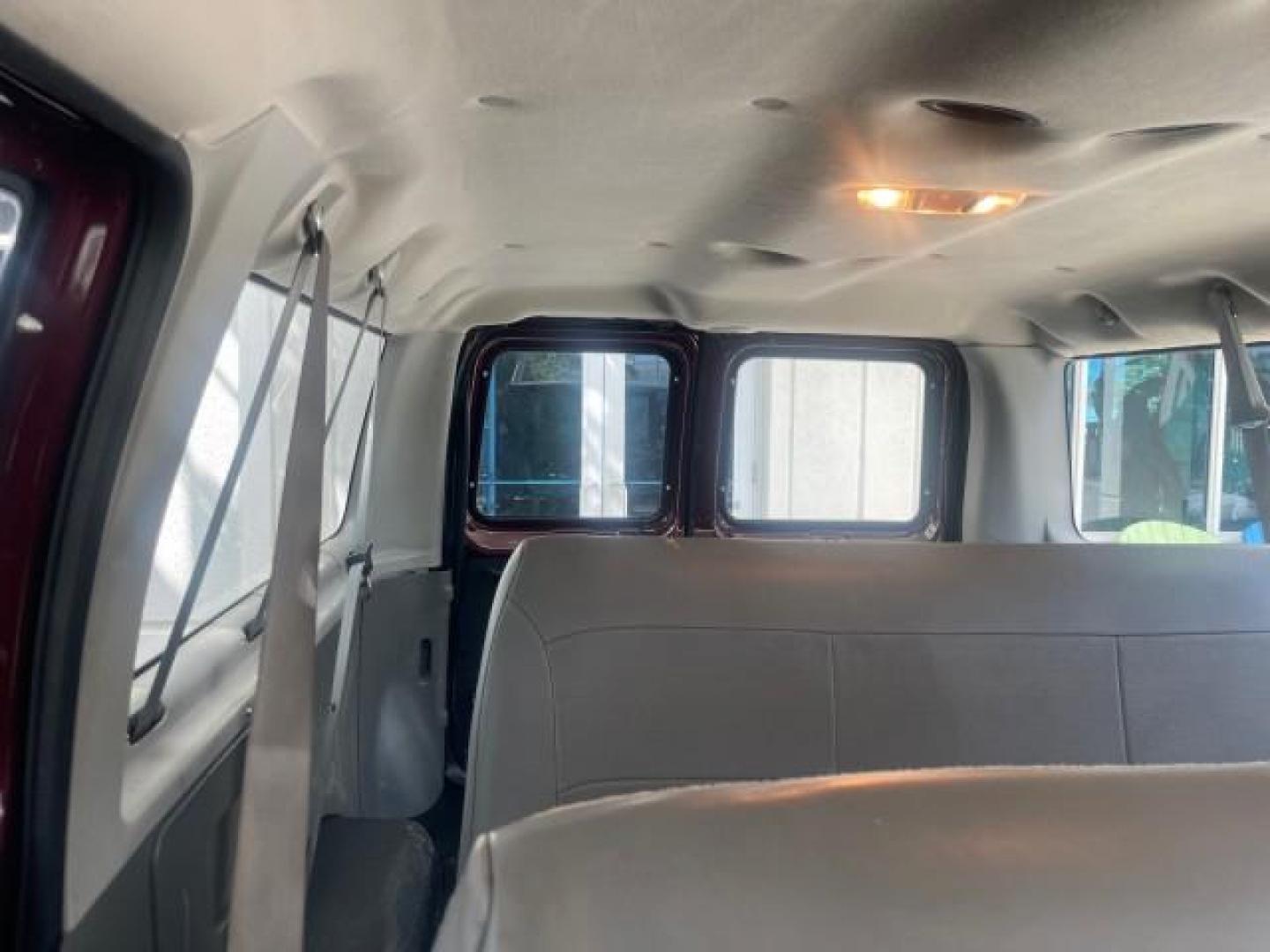 2006 Dark Toreador Red Metallic /Medium Flint Ford Econoline Wagon XLT 8 PASS LOW MILES 56290 (1FMRE11W06D) with an 4.6L EFI V8 Engine engine, Automatic transmission, located at 4701 North Dixie Hwy, Pompano Beach, FL, 33064, (954) 422-2889, 26.240938, -80.123474 - OUR WEBPAGE FLORIDACARS1.COM HAS OVER 100 PHOTOS AND FREE CARFAX LINK 2006 FORD E-SERIES E-150 XLT VIN: 1FMRE11W06DA64988 1 F M R E 1 1 W 0 6 D A 6 4 9 8 8 VAN 4.6L V8 F GASOLINE REAR WHEEL DRIVE Features ABS Brakes Air Conditioning AM/FM Stereo Automatic Transmission CD Audio Cruise Control Power L - Photo#70
