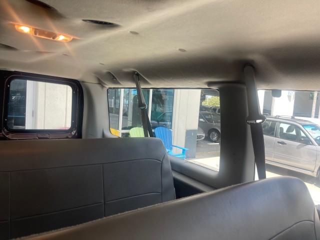 2006 Dark Toreador Red Metallic /Medium Flint Ford Econoline Wagon XLT 8 PASS LOW MILES 56328 (1FMRE11W06D) with an 4.6L EFI V8 Engine engine, Automatic transmission, located at 4701 North Dixie Hwy, Pompano Beach, FL, 33064, (954) 422-2889, 26.240938, -80.123474 - OUR WEBPAGE FLORIDACARS1.COM HAS OVER 100 PHOTOS AND FREE CARFAX LINK 2006 FORD E-SERIES E-150 XLT VIN: 1FMRE11W06DA64988 1 F M R E 1 1 W 0 6 D A 6 4 9 8 8 VAN 4.6L V8 F GASOLINE REAR WHEEL DRIVE Features ABS Brakes Air Conditioning AM/FM Stereo Automatic Transmission CD Audio Cruise Control Power L - Photo#72