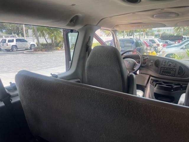 2006 Dark Toreador Red Metallic /Medium Flint Ford Econoline Wagon XLT 8 PASS LOW MILES 56328 (1FMRE11W06D) with an 4.6L EFI V8 Engine engine, Automatic transmission, located at 4701 North Dixie Hwy, Pompano Beach, FL, 33064, (954) 422-2889, 26.240938, -80.123474 - OUR WEBPAGE FLORIDACARS1.COM HAS OVER 100 PHOTOS AND FREE CARFAX LINK 2006 FORD E-SERIES E-150 XLT VIN: 1FMRE11W06DA64988 1 F M R E 1 1 W 0 6 D A 6 4 9 8 8 VAN 4.6L V8 F GASOLINE REAR WHEEL DRIVE Features ABS Brakes Air Conditioning AM/FM Stereo Automatic Transmission CD Audio Cruise Control Power L - Photo#73