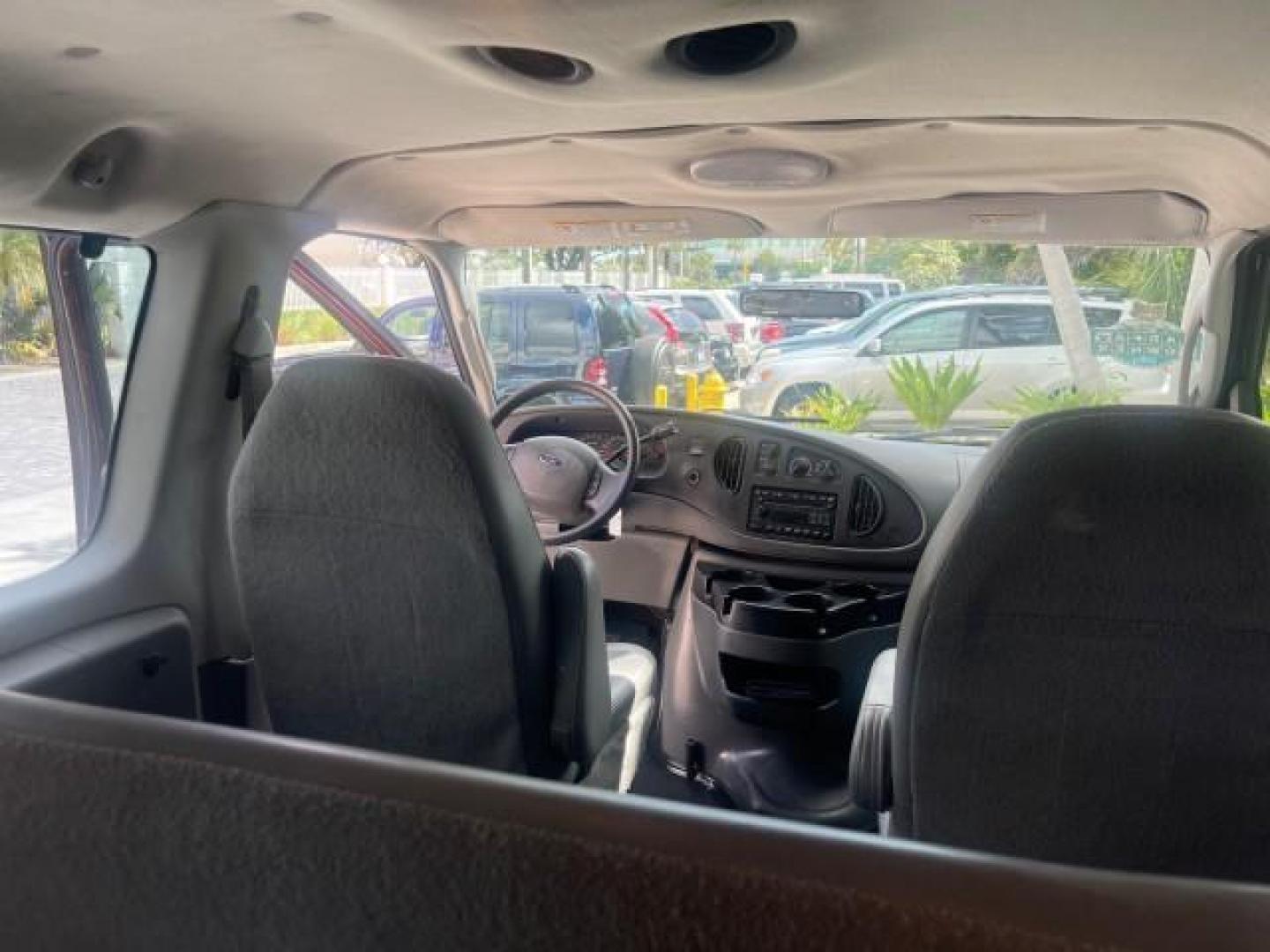 2006 Dark Toreador Red Metallic /Medium Flint Ford Econoline Wagon XLT 8 PASS LOW MILES 56290 (1FMRE11W06D) with an 4.6L EFI V8 Engine engine, Automatic transmission, located at 4701 North Dixie Hwy, Pompano Beach, FL, 33064, (954) 422-2889, 26.240938, -80.123474 - OUR WEBPAGE FLORIDACARS1.COM HAS OVER 100 PHOTOS AND FREE CARFAX LINK 2006 FORD E-SERIES E-150 XLT VIN: 1FMRE11W06DA64988 1 F M R E 1 1 W 0 6 D A 6 4 9 8 8 VAN 4.6L V8 F GASOLINE REAR WHEEL DRIVE Features ABS Brakes Air Conditioning AM/FM Stereo Automatic Transmission CD Audio Cruise Control Power L - Photo#74