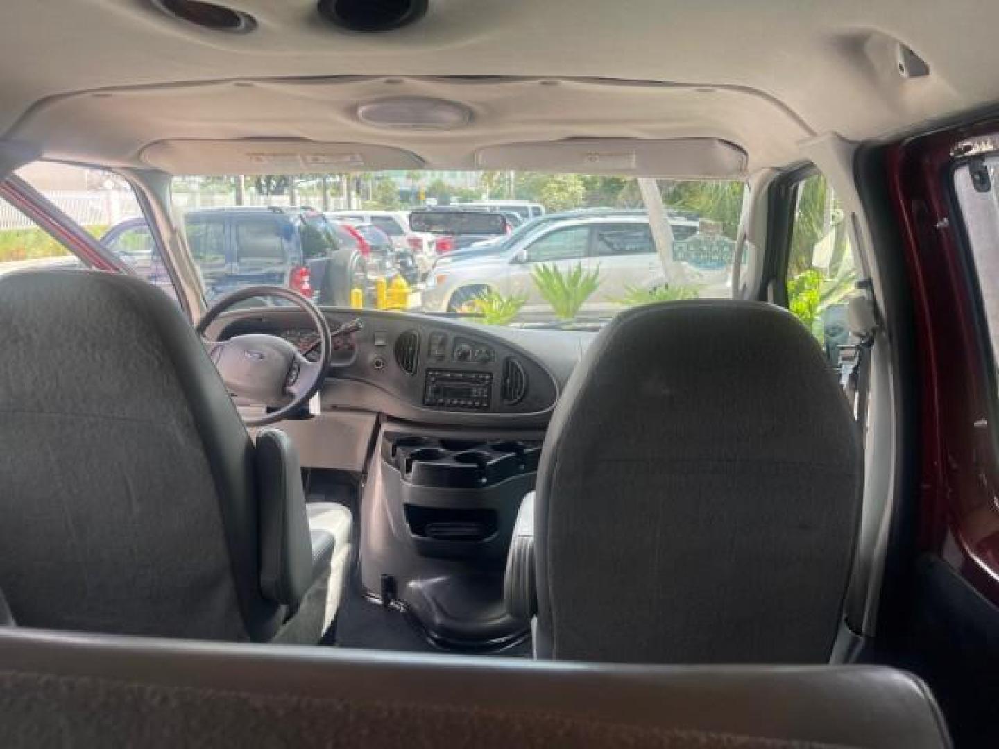 2006 Dark Toreador Red Metallic /Medium Flint Ford Econoline Wagon XLT 8 PASS LOW MILES 56290 (1FMRE11W06D) with an 4.6L EFI V8 Engine engine, Automatic transmission, located at 4701 North Dixie Hwy, Pompano Beach, FL, 33064, (954) 422-2889, 26.240938, -80.123474 - OUR WEBPAGE FLORIDACARS1.COM HAS OVER 100 PHOTOS AND FREE CARFAX LINK 2006 FORD E-SERIES E-150 XLT VIN: 1FMRE11W06DA64988 1 F M R E 1 1 W 0 6 D A 6 4 9 8 8 VAN 4.6L V8 F GASOLINE REAR WHEEL DRIVE Features ABS Brakes Air Conditioning AM/FM Stereo Automatic Transmission CD Audio Cruise Control Power L - Photo#75