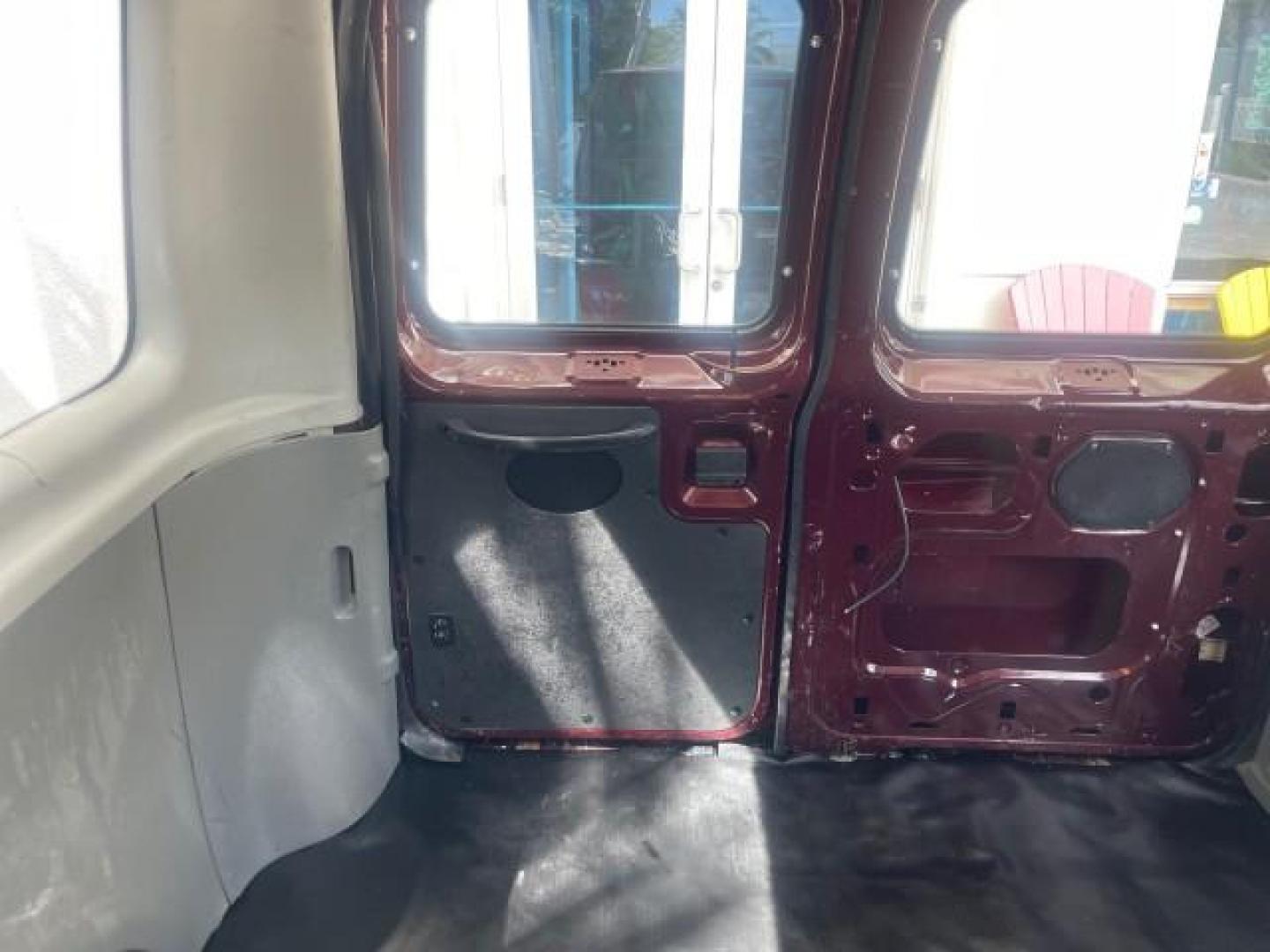 2006 Dark Toreador Red Metallic /Medium Flint Ford Econoline Wagon XLT 8 PASS LOW MILES 56290 (1FMRE11W06D) with an 4.6L EFI V8 Engine engine, Automatic transmission, located at 4701 North Dixie Hwy, Pompano Beach, FL, 33064, (954) 422-2889, 26.240938, -80.123474 - OUR WEBPAGE FLORIDACARS1.COM HAS OVER 100 PHOTOS AND FREE CARFAX LINK 2006 FORD E-SERIES E-150 XLT VIN: 1FMRE11W06DA64988 1 F M R E 1 1 W 0 6 D A 6 4 9 8 8 VAN 4.6L V8 F GASOLINE REAR WHEEL DRIVE Features ABS Brakes Air Conditioning AM/FM Stereo Automatic Transmission CD Audio Cruise Control Power L - Photo#77