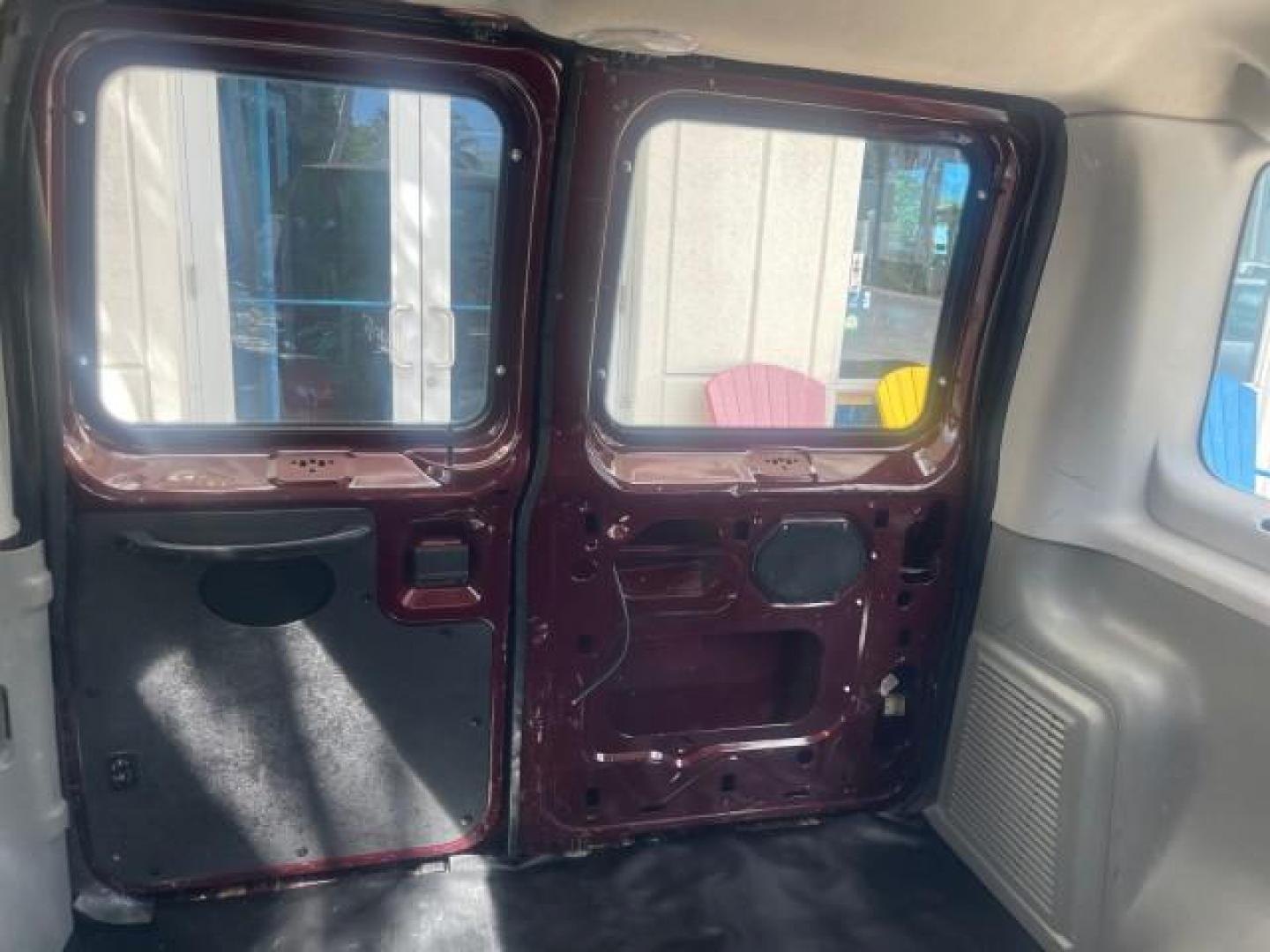 2006 Dark Toreador Red Metallic /Medium Flint Ford Econoline Wagon XLT 8 PASS LOW MILES 56290 (1FMRE11W06D) with an 4.6L EFI V8 Engine engine, Automatic transmission, located at 4701 North Dixie Hwy, Pompano Beach, FL, 33064, (954) 422-2889, 26.240938, -80.123474 - OUR WEBPAGE FLORIDACARS1.COM HAS OVER 100 PHOTOS AND FREE CARFAX LINK 2006 FORD E-SERIES E-150 XLT VIN: 1FMRE11W06DA64988 1 F M R E 1 1 W 0 6 D A 6 4 9 8 8 VAN 4.6L V8 F GASOLINE REAR WHEEL DRIVE Features ABS Brakes Air Conditioning AM/FM Stereo Automatic Transmission CD Audio Cruise Control Power L - Photo#78