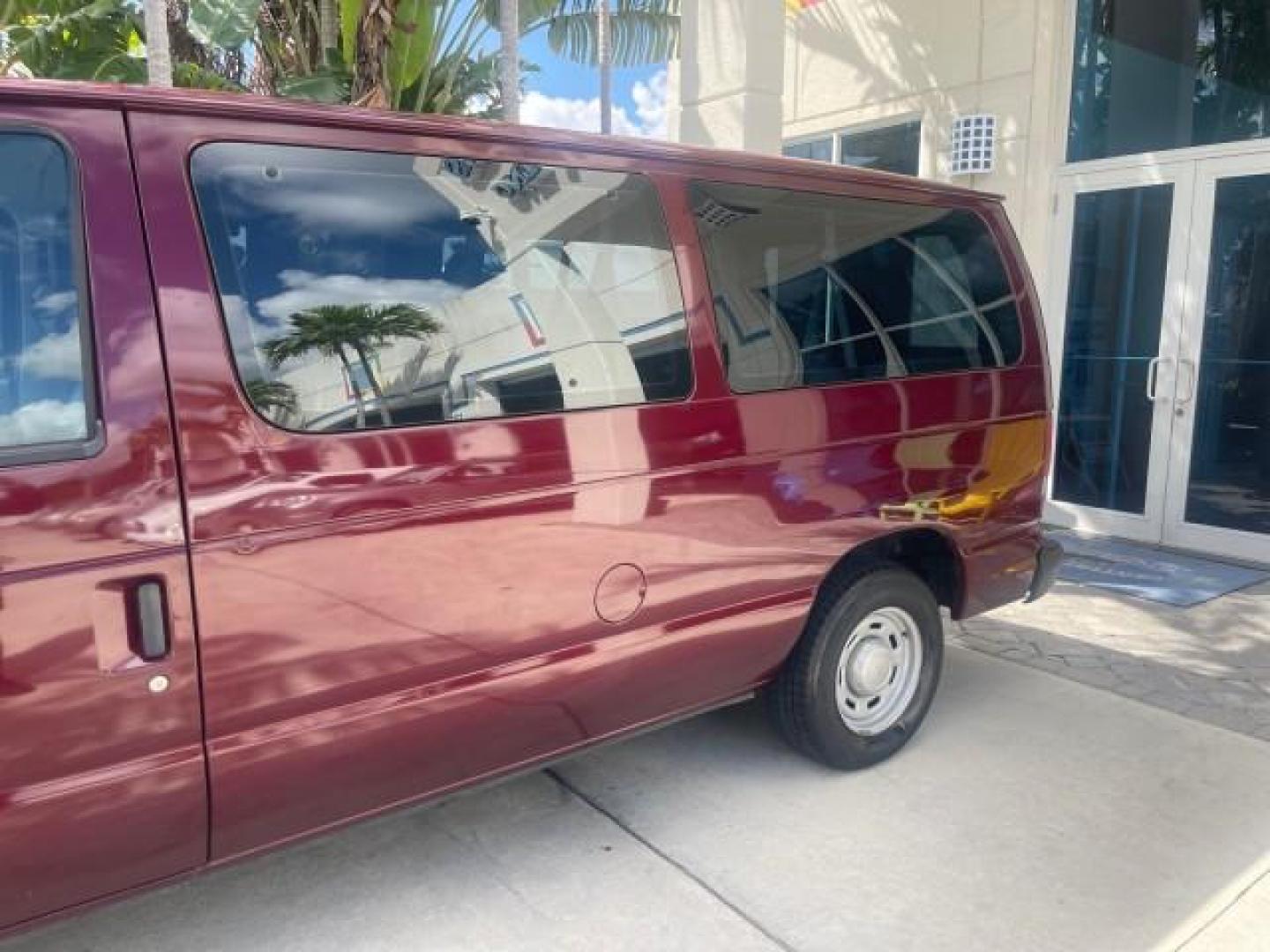 2006 Dark Toreador Red Metallic /Medium Flint Ford Econoline Wagon XLT 8 PASS LOW MILES 56290 (1FMRE11W06D) with an 4.6L EFI V8 Engine engine, Automatic transmission, located at 4701 North Dixie Hwy, Pompano Beach, FL, 33064, (954) 422-2889, 26.240938, -80.123474 - OUR WEBPAGE FLORIDACARS1.COM HAS OVER 100 PHOTOS AND FREE CARFAX LINK 2006 FORD E-SERIES E-150 XLT VIN: 1FMRE11W06DA64988 1 F M R E 1 1 W 0 6 D A 6 4 9 8 8 VAN 4.6L V8 F GASOLINE REAR WHEEL DRIVE Features ABS Brakes Air Conditioning AM/FM Stereo Automatic Transmission CD Audio Cruise Control Power L - Photo#81