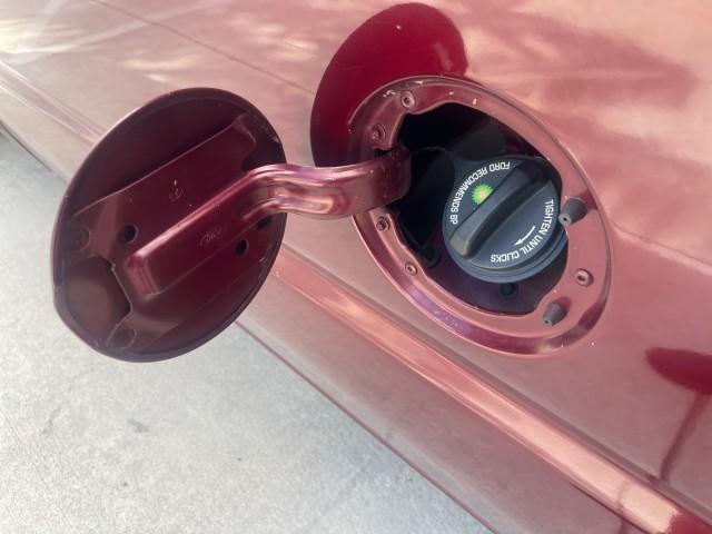 2006 Dark Toreador Red Metallic /Medium Flint Ford Econoline Wagon XLT 8 PASS LOW MILES 56328 (1FMRE11W06D) with an 4.6L EFI V8 Engine engine, Automatic transmission, located at 4701 North Dixie Hwy, Pompano Beach, FL, 33064, (954) 422-2889, 26.240938, -80.123474 - OUR WEBPAGE FLORIDACARS1.COM HAS OVER 100 PHOTOS AND FREE CARFAX LINK 2006 FORD E-SERIES E-150 XLT VIN: 1FMRE11W06DA64988 1 F M R E 1 1 W 0 6 D A 6 4 9 8 8 VAN 4.6L V8 F GASOLINE REAR WHEEL DRIVE Features ABS Brakes Air Conditioning AM/FM Stereo Automatic Transmission CD Audio Cruise Control Power L - Photo#83