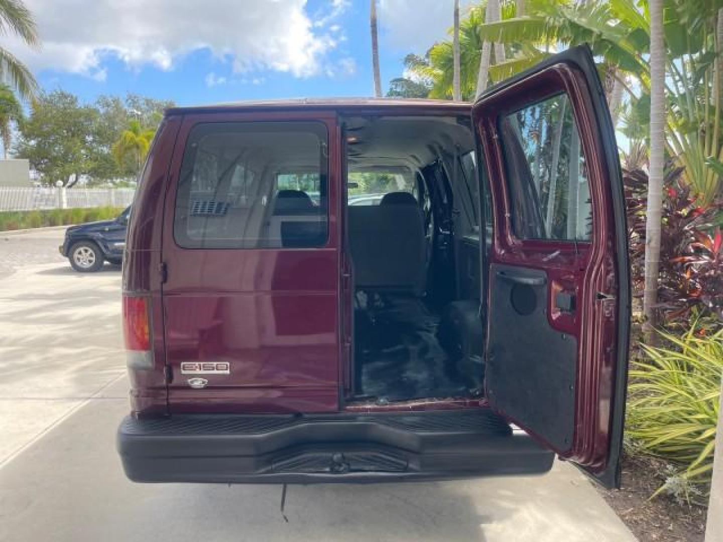 2006 Dark Toreador Red Metallic /Medium Flint Ford Econoline Wagon XLT 8 PASS LOW MILES 56290 (1FMRE11W06D) with an 4.6L EFI V8 Engine engine, Automatic transmission, located at 4701 North Dixie Hwy, Pompano Beach, FL, 33064, (954) 422-2889, 26.240938, -80.123474 - OUR WEBPAGE FLORIDACARS1.COM HAS OVER 100 PHOTOS AND FREE CARFAX LINK 2006 FORD E-SERIES E-150 XLT VIN: 1FMRE11W06DA64988 1 F M R E 1 1 W 0 6 D A 6 4 9 8 8 VAN 4.6L V8 F GASOLINE REAR WHEEL DRIVE Features ABS Brakes Air Conditioning AM/FM Stereo Automatic Transmission CD Audio Cruise Control Power L - Photo#89