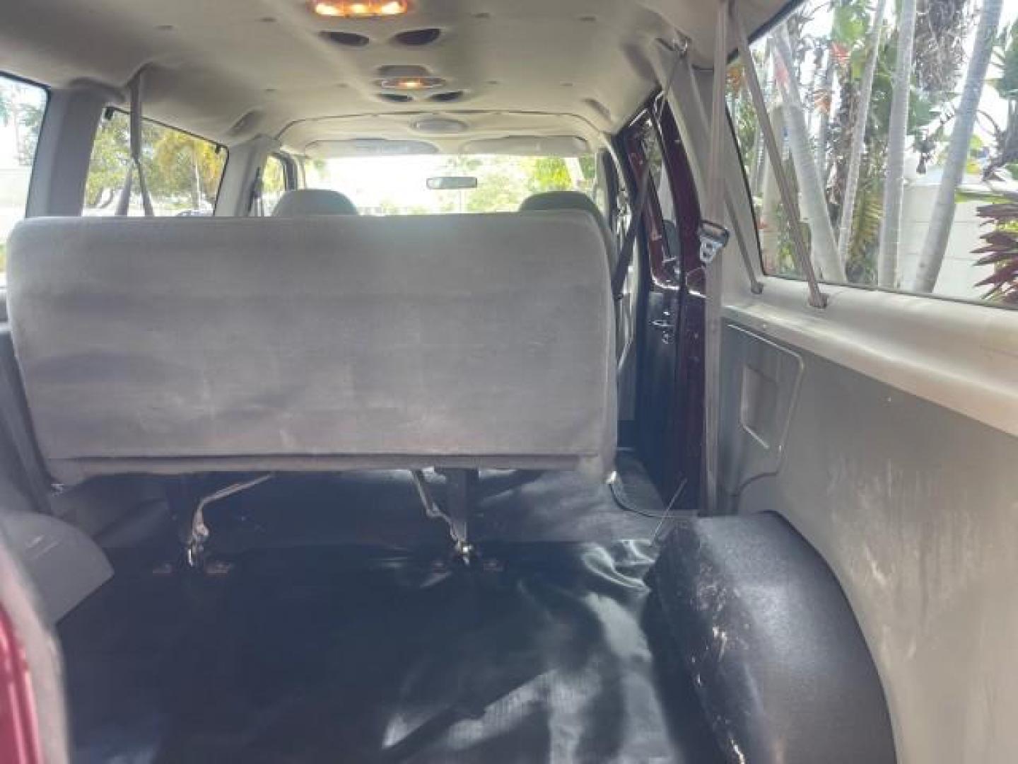 2006 Dark Toreador Red Metallic /Medium Flint Ford Econoline Wagon XLT 8 PASS LOW MILES 56290 (1FMRE11W06D) with an 4.6L EFI V8 Engine engine, Automatic transmission, located at 4701 North Dixie Hwy, Pompano Beach, FL, 33064, (954) 422-2889, 26.240938, -80.123474 - OUR WEBPAGE FLORIDACARS1.COM HAS OVER 100 PHOTOS AND FREE CARFAX LINK 2006 FORD E-SERIES E-150 XLT VIN: 1FMRE11W06DA64988 1 F M R E 1 1 W 0 6 D A 6 4 9 8 8 VAN 4.6L V8 F GASOLINE REAR WHEEL DRIVE Features ABS Brakes Air Conditioning AM/FM Stereo Automatic Transmission CD Audio Cruise Control Power L - Photo#90