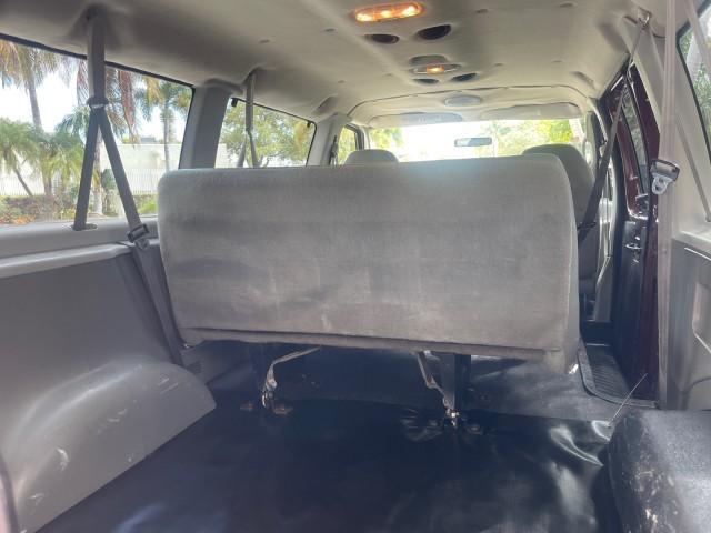 2006 Dark Toreador Red Metallic /Medium Flint Ford Econoline Wagon XLT 8 PASS LOW MILES 56328 (1FMRE11W06D) with an 4.6L EFI V8 Engine engine, Automatic transmission, located at 4701 North Dixie Hwy, Pompano Beach, FL, 33064, (954) 422-2889, 26.240938, -80.123474 - OUR WEBPAGE FLORIDACARS1.COM HAS OVER 100 PHOTOS AND FREE CARFAX LINK 2006 FORD E-SERIES E-150 XLT VIN: 1FMRE11W06DA64988 1 F M R E 1 1 W 0 6 D A 6 4 9 8 8 VAN 4.6L V8 F GASOLINE REAR WHEEL DRIVE Features ABS Brakes Air Conditioning AM/FM Stereo Automatic Transmission CD Audio Cruise Control Power L - Photo#91