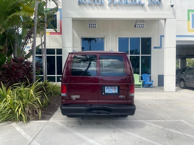 2006 Dark Toreador Red Metallic /Medium Flint Ford Econoline Wagon XLT 8 PASS LOW MILES 56328 (1FMRE11W06D) with an 4.6L EFI V8 Engine engine, Automatic transmission, located at 4701 North Dixie Hwy, Pompano Beach, FL, 33064, (954) 422-2889, 26.240938, -80.123474 - OUR WEBPAGE FLORIDACARS1.COM HAS OVER 100 PHOTOS AND FREE CARFAX LINK 2006 FORD E-SERIES E-150 XLT VIN: 1FMRE11W06DA64988 1 F M R E 1 1 W 0 6 D A 6 4 9 8 8 VAN 4.6L V8 F GASOLINE REAR WHEEL DRIVE Features ABS Brakes Air Conditioning AM/FM Stereo Automatic Transmission CD Audio Cruise Control Power L - Photo#93