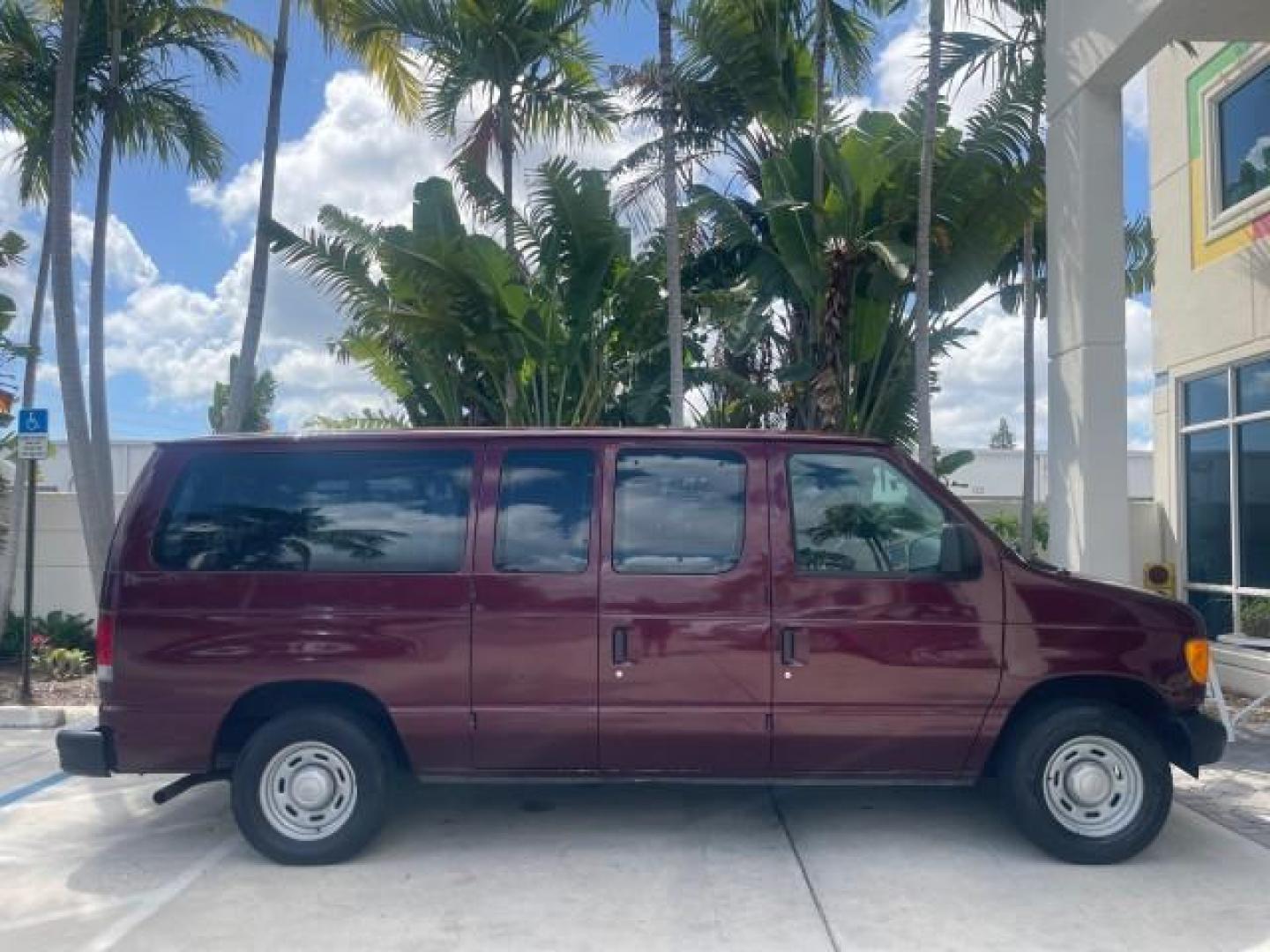 2006 Dark Toreador Red Metallic /Medium Flint Ford Econoline Wagon XLT 8 PASS LOW MILES 56290 (1FMRE11W06D) with an 4.6L EFI V8 Engine engine, Automatic transmission, located at 4701 North Dixie Hwy, Pompano Beach, FL, 33064, (954) 422-2889, 26.240938, -80.123474 - OUR WEBPAGE FLORIDACARS1.COM HAS OVER 100 PHOTOS AND FREE CARFAX LINK 2006 FORD E-SERIES E-150 XLT VIN: 1FMRE11W06DA64988 1 F M R E 1 1 W 0 6 D A 6 4 9 8 8 VAN 4.6L V8 F GASOLINE REAR WHEEL DRIVE Features ABS Brakes Air Conditioning AM/FM Stereo Automatic Transmission CD Audio Cruise Control Power L - Photo#98