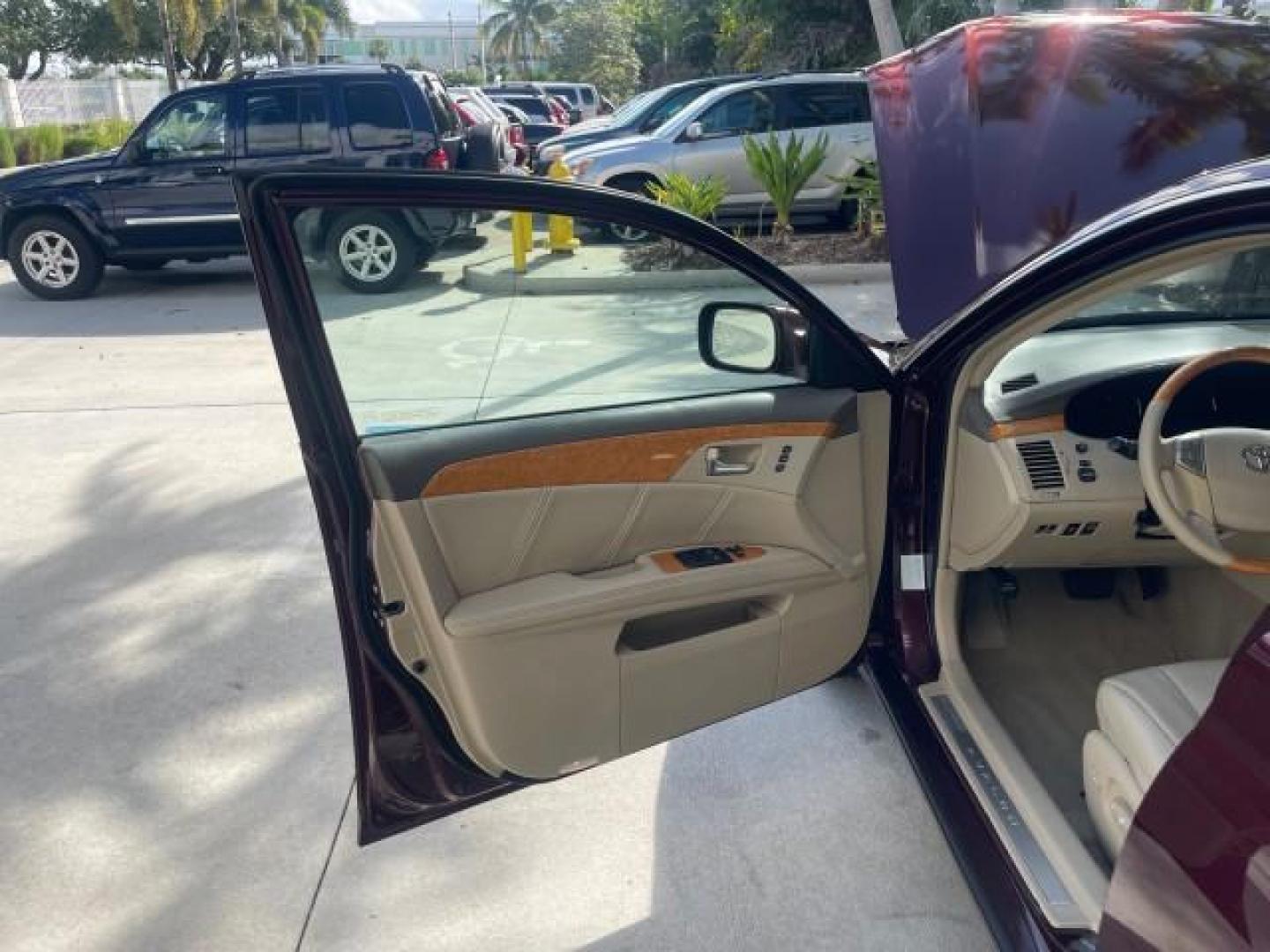 2006 Cassis Pearl /Ivory Toyota Avalon Limited 1 OWNER FL LOW MILES 49391 (4T1BK36B36U) with an 3.5L 24-Valve EFI DOHC V6 Engine engine, Automatic transmission, located at 4701 North Dixie Hwy, Pompano Beach, FL, 33064, (954) 422-2889, 26.240938, -80.123474 - OUR WEBPAGE FLORIDACARS1.COM HAS OVER 100 PHOTOS AND FREE CARFAX LINK 2006 TOYOTA AVALON LIMITED VIN: 4T1BK36B36U142787 4 T 1 B K 3 6 B 3 6 U 1 4 2 7 8 7 SEDAN 4 DR 3.5L V6 F DOHC 24V GASOLINE 31 MPG FRONT WHEEL DRIVE Features ABS Brakes Air Conditioning Alloy Wheels AM/FM Stereo Automatic Transmiss - Photo#9