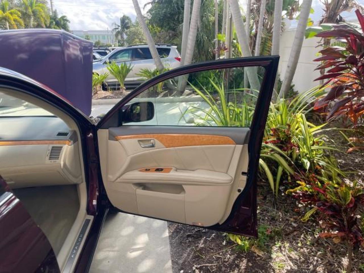 2006 Cassis Pearl /Ivory Toyota Avalon Limited 1 OWNER FL LOW MILES 49391 (4T1BK36B36U) with an 3.5L 24-Valve EFI DOHC V6 Engine engine, Automatic transmission, located at 4701 North Dixie Hwy, Pompano Beach, FL, 33064, (954) 422-2889, 26.240938, -80.123474 - OUR WEBPAGE FLORIDACARS1.COM HAS OVER 100 PHOTOS AND FREE CARFAX LINK 2006 TOYOTA AVALON LIMITED VIN: 4T1BK36B36U142787 4 T 1 B K 3 6 B 3 6 U 1 4 2 7 8 7 SEDAN 4 DR 3.5L V6 F DOHC 24V GASOLINE 31 MPG FRONT WHEEL DRIVE Features ABS Brakes Air Conditioning Alloy Wheels AM/FM Stereo Automatic Transmiss - Photo#11