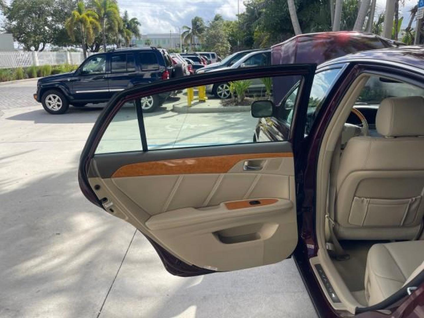 2006 Cassis Pearl /Ivory Toyota Avalon Limited 1 OWNER FL LOW MILES 49391 (4T1BK36B36U) with an 3.5L 24-Valve EFI DOHC V6 Engine engine, Automatic transmission, located at 4701 North Dixie Hwy, Pompano Beach, FL, 33064, (954) 422-2889, 26.240938, -80.123474 - OUR WEBPAGE FLORIDACARS1.COM HAS OVER 100 PHOTOS AND FREE CARFAX LINK 2006 TOYOTA AVALON LIMITED VIN: 4T1BK36B36U142787 4 T 1 B K 3 6 B 3 6 U 1 4 2 7 8 7 SEDAN 4 DR 3.5L V6 F DOHC 24V GASOLINE 31 MPG FRONT WHEEL DRIVE Features ABS Brakes Air Conditioning Alloy Wheels AM/FM Stereo Automatic Transmiss - Photo#13