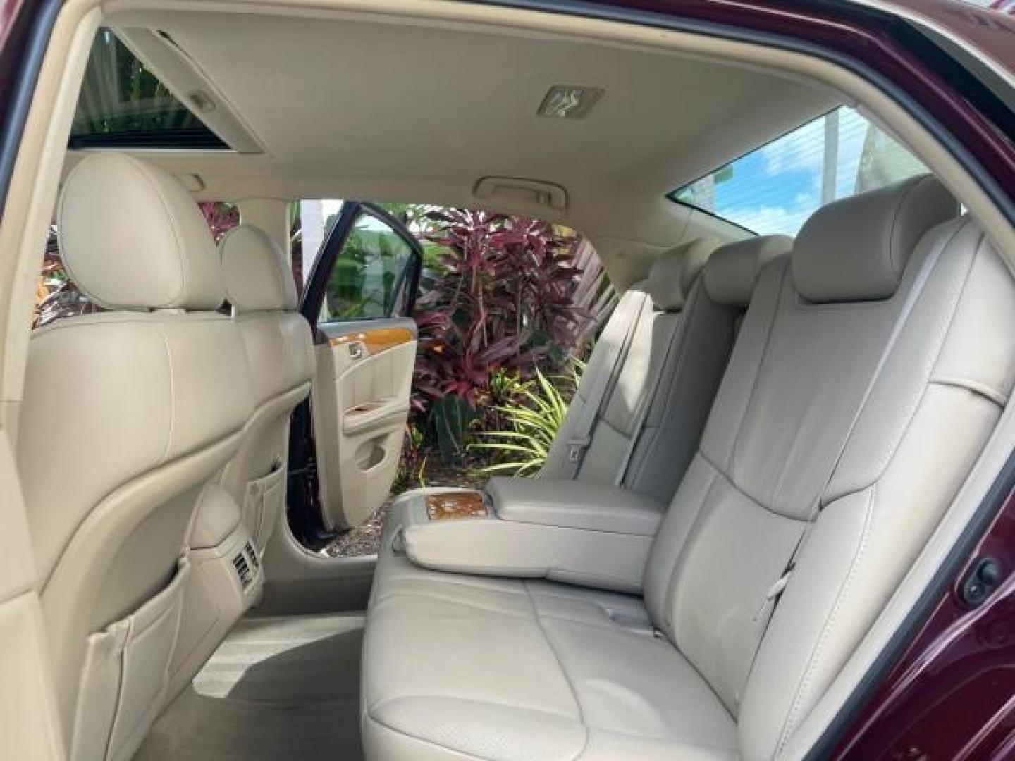 2006 Cassis Pearl /Ivory Toyota Avalon Limited 1 OWNER FL LOW MILES 49391 (4T1BK36B36U) with an 3.5L 24-Valve EFI DOHC V6 Engine engine, Automatic transmission, located at 4701 North Dixie Hwy, Pompano Beach, FL, 33064, (954) 422-2889, 26.240938, -80.123474 - OUR WEBPAGE FLORIDACARS1.COM HAS OVER 100 PHOTOS AND FREE CARFAX LINK 2006 TOYOTA AVALON LIMITED VIN: 4T1BK36B36U142787 4 T 1 B K 3 6 B 3 6 U 1 4 2 7 8 7 SEDAN 4 DR 3.5L V6 F DOHC 24V GASOLINE 31 MPG FRONT WHEEL DRIVE Features ABS Brakes Air Conditioning Alloy Wheels AM/FM Stereo Automatic Transmiss - Photo#14