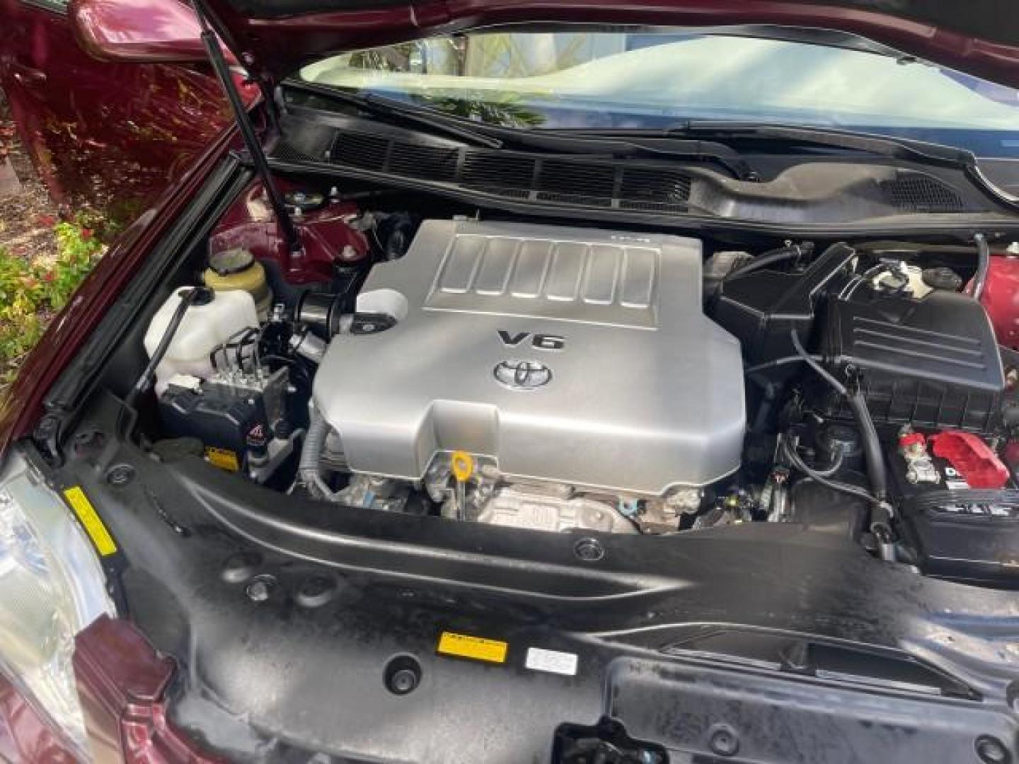 2006 Cassis Pearl /Ivory Toyota Avalon Limited 1 OWNER FL LOW MILES 49391 (4T1BK36B36U) with an 3.5L 24-Valve EFI DOHC V6 Engine engine, Automatic transmission, located at 4701 North Dixie Hwy, Pompano Beach, FL, 33064, (954) 422-2889, 26.240938, -80.123474 - OUR WEBPAGE FLORIDACARS1.COM HAS OVER 100 PHOTOS AND FREE CARFAX LINK 2006 TOYOTA AVALON LIMITED VIN: 4T1BK36B36U142787 4 T 1 B K 3 6 B 3 6 U 1 4 2 7 8 7 SEDAN 4 DR 3.5L V6 F DOHC 24V GASOLINE 31 MPG FRONT WHEEL DRIVE Features ABS Brakes Air Conditioning Alloy Wheels AM/FM Stereo Automatic Transmiss - Photo#25