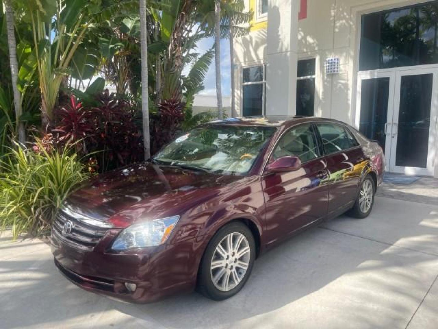 2006 Cassis Pearl /Ivory Toyota Avalon Limited 1 OWNER FL LOW MILES 49391 (4T1BK36B36U) with an 3.5L 24-Valve EFI DOHC V6 Engine engine, Automatic transmission, located at 4701 North Dixie Hwy, Pompano Beach, FL, 33064, (954) 422-2889, 26.240938, -80.123474 - OUR WEBPAGE FLORIDACARS1.COM HAS OVER 100 PHOTOS AND FREE CARFAX LINK 2006 TOYOTA AVALON LIMITED VIN: 4T1BK36B36U142787 4 T 1 B K 3 6 B 3 6 U 1 4 2 7 8 7 SEDAN 4 DR 3.5L V6 F DOHC 24V GASOLINE 31 MPG FRONT WHEEL DRIVE Features ABS Brakes Air Conditioning Alloy Wheels AM/FM Stereo Automatic Transmiss - Photo#30