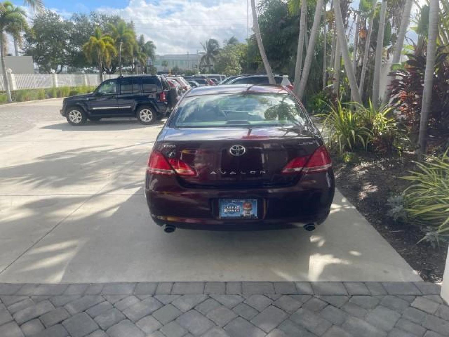 2006 Cassis Pearl /Ivory Toyota Avalon Limited 1 OWNER FL LOW MILES 49391 (4T1BK36B36U) with an 3.5L 24-Valve EFI DOHC V6 Engine engine, Automatic transmission, located at 4701 North Dixie Hwy, Pompano Beach, FL, 33064, (954) 422-2889, 26.240938, -80.123474 - OUR WEBPAGE FLORIDACARS1.COM HAS OVER 100 PHOTOS AND FREE CARFAX LINK 2006 TOYOTA AVALON LIMITED VIN: 4T1BK36B36U142787 4 T 1 B K 3 6 B 3 6 U 1 4 2 7 8 7 SEDAN 4 DR 3.5L V6 F DOHC 24V GASOLINE 31 MPG FRONT WHEEL DRIVE Features ABS Brakes Air Conditioning Alloy Wheels AM/FM Stereo Automatic Transmiss - Photo#35