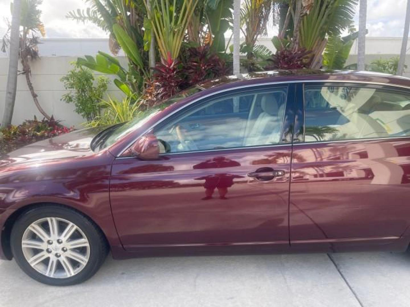 2006 Cassis Pearl /Ivory Toyota Avalon Limited 1 OWNER FL LOW MILES 49391 (4T1BK36B36U) with an 3.5L 24-Valve EFI DOHC V6 Engine engine, Automatic transmission, located at 4701 North Dixie Hwy, Pompano Beach, FL, 33064, (954) 422-2889, 26.240938, -80.123474 - OUR WEBPAGE FLORIDACARS1.COM HAS OVER 100 PHOTOS AND FREE CARFAX LINK 2006 TOYOTA AVALON LIMITED VIN: 4T1BK36B36U142787 4 T 1 B K 3 6 B 3 6 U 1 4 2 7 8 7 SEDAN 4 DR 3.5L V6 F DOHC 24V GASOLINE 31 MPG FRONT WHEEL DRIVE Features ABS Brakes Air Conditioning Alloy Wheels AM/FM Stereo Automatic Transmiss - Photo#37