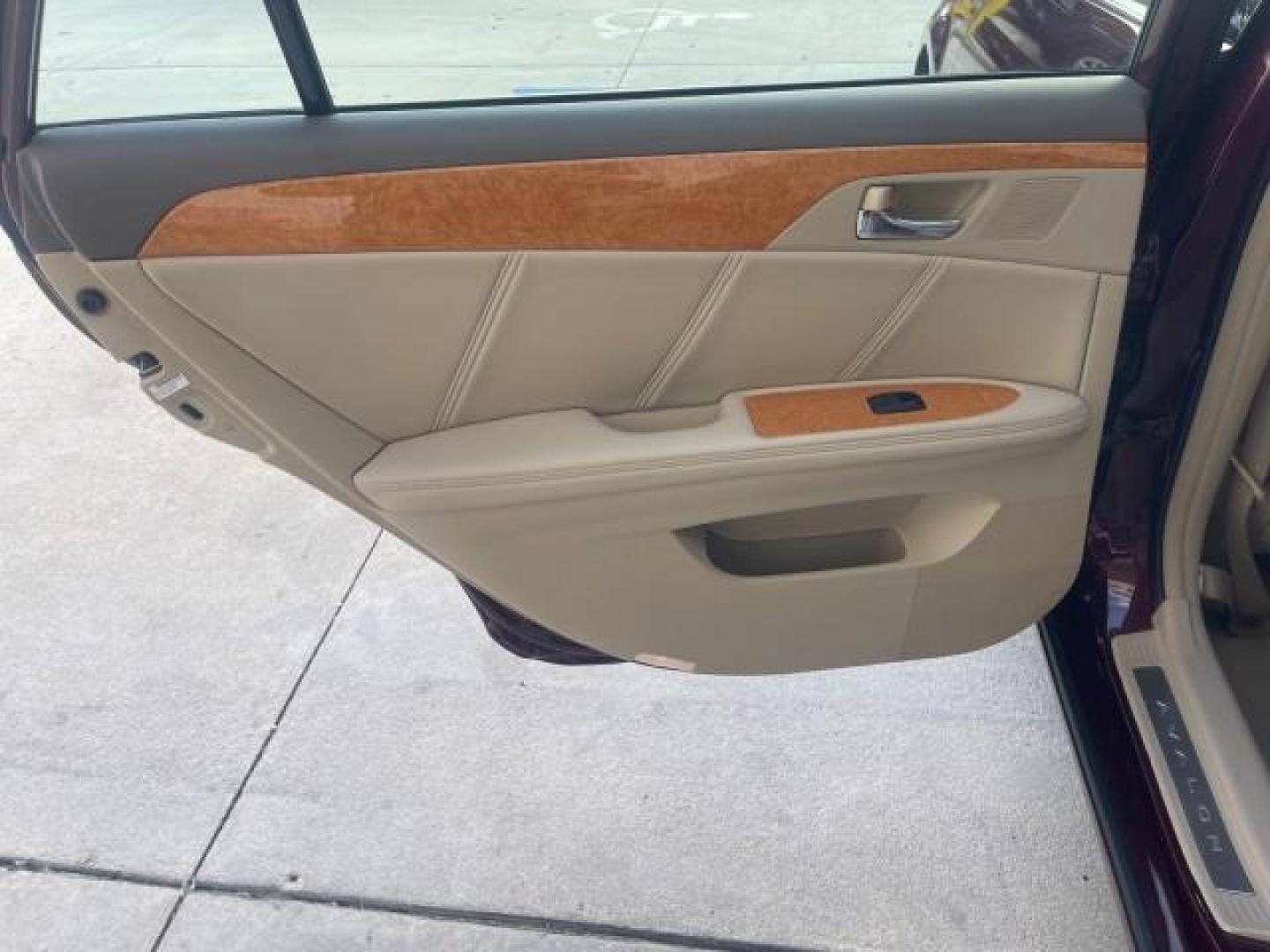 2006 Cassis Pearl /Ivory Toyota Avalon Limited 1 OWNER FL LOW MILES 49391 (4T1BK36B36U) with an 3.5L 24-Valve EFI DOHC V6 Engine engine, Automatic transmission, located at 4701 North Dixie Hwy, Pompano Beach, FL, 33064, (954) 422-2889, 26.240938, -80.123474 - OUR WEBPAGE FLORIDACARS1.COM HAS OVER 100 PHOTOS AND FREE CARFAX LINK 2006 TOYOTA AVALON LIMITED VIN: 4T1BK36B36U142787 4 T 1 B K 3 6 B 3 6 U 1 4 2 7 8 7 SEDAN 4 DR 3.5L V6 F DOHC 24V GASOLINE 31 MPG FRONT WHEEL DRIVE Features ABS Brakes Air Conditioning Alloy Wheels AM/FM Stereo Automatic Transmiss - Photo#69