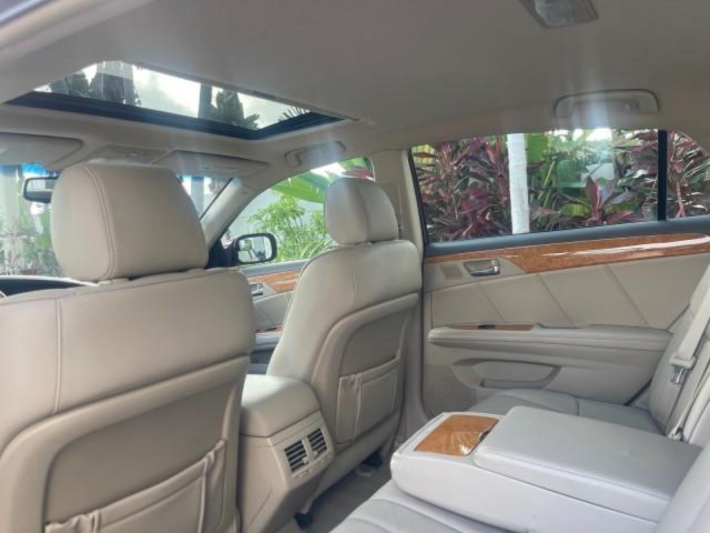 2006 Cassis Pearl /Ivory Toyota Avalon Limited 1 OWNER FL LOW MILES 49391 (4T1BK36B36U) with an 3.5L 24-Valve EFI DOHC V6 Engine engine, Automatic transmission, located at 4701 North Dixie Hwy, Pompano Beach, FL, 33064, (954) 422-2889, 26.240938, -80.123474 - OUR WEBPAGE FLORIDACARS1.COM HAS OVER 100 PHOTOS AND FREE CARFAX LINK 2006 TOYOTA AVALON LIMITED VIN: 4T1BK36B36U142787 4 T 1 B K 3 6 B 3 6 U 1 4 2 7 8 7 SEDAN 4 DR 3.5L V6 F DOHC 24V GASOLINE 31 MPG FRONT WHEEL DRIVE Features ABS Brakes Air Conditioning Alloy Wheels AM/FM Stereo Automatic Transmiss - Photo#72